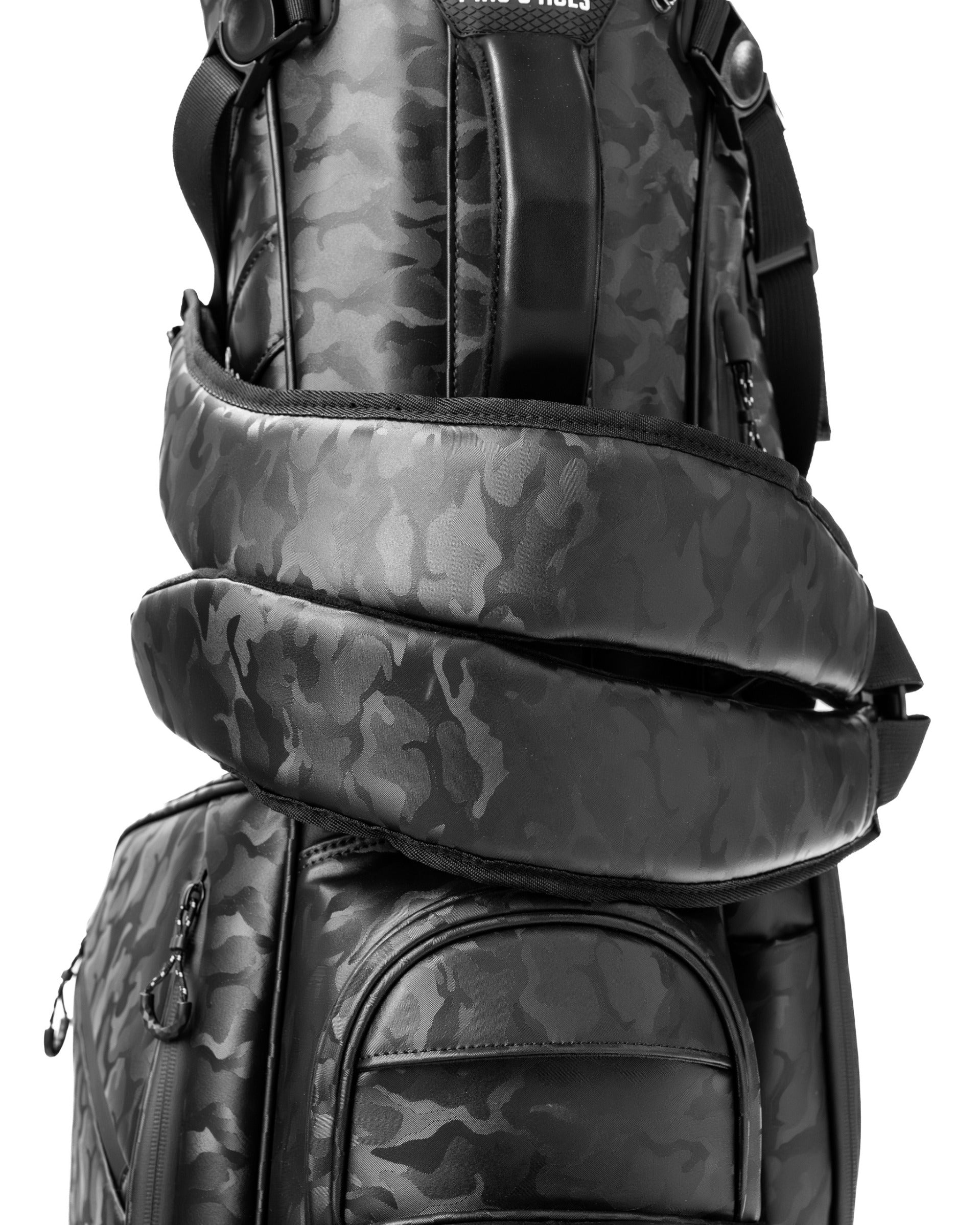 Stylish black camo golf bag featuring padded straps and multiple pockets for convenience on the course.