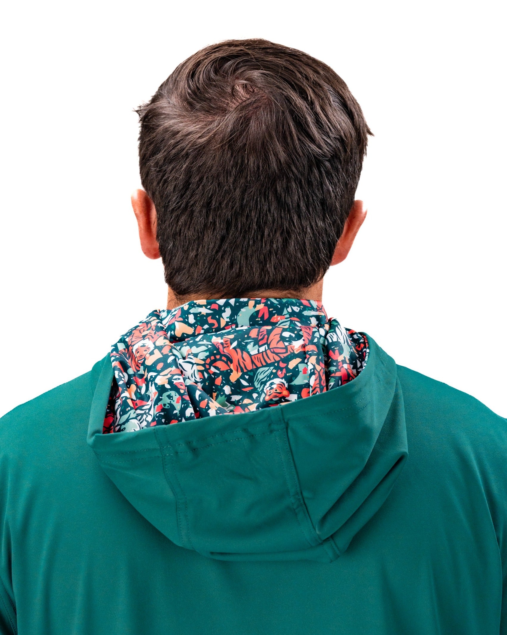 Men's performance golf hoodie in teal with a colorful floral interior, designed for style and comfort on the course.