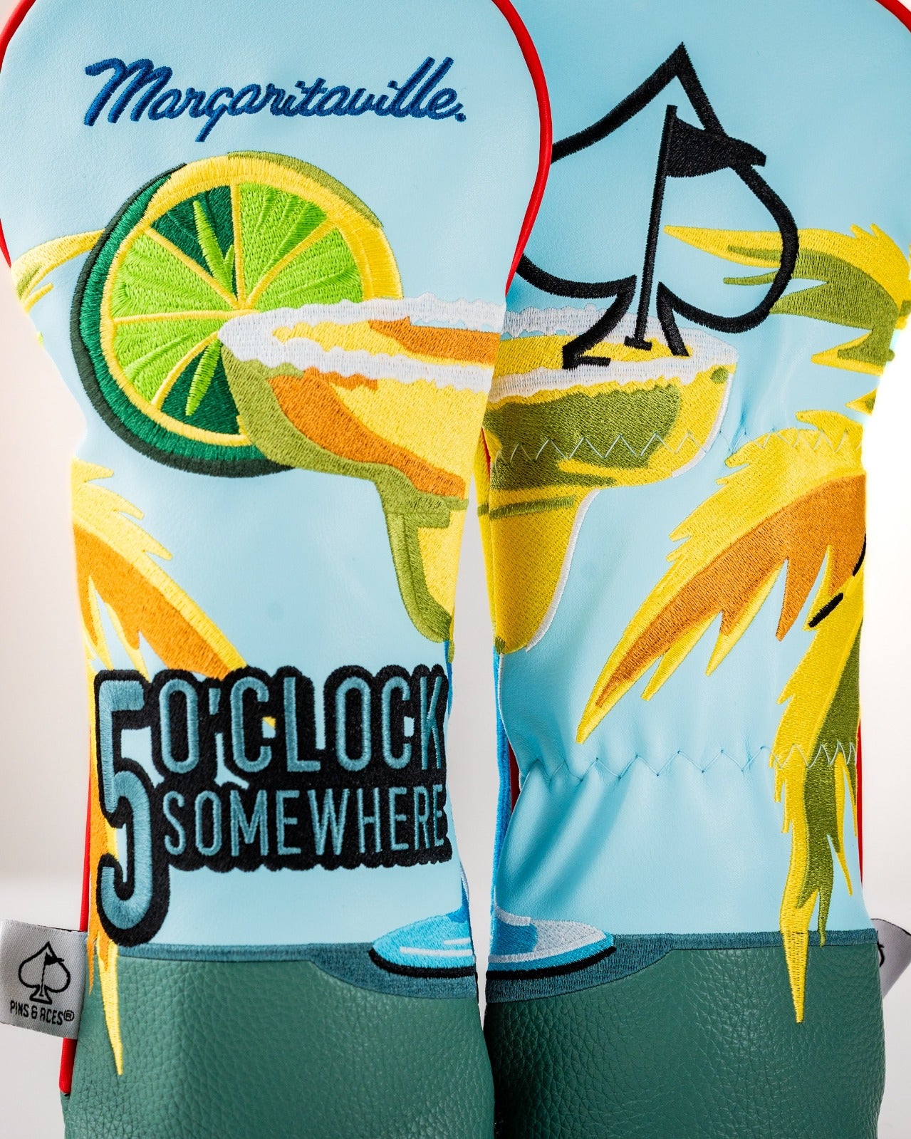 Colorful Margaritaville 5 O'Clock Somewhere fairway headcover featuring tropical drink and palm tree designs.
