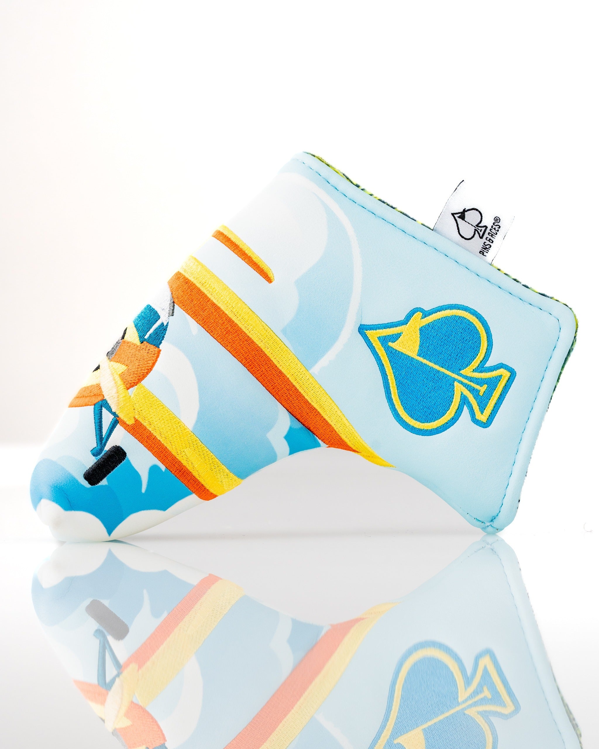 Colorful Margaritaville Puddle Jumper blade putter cover featuring a fun design with a beach theme and vibrant colors.