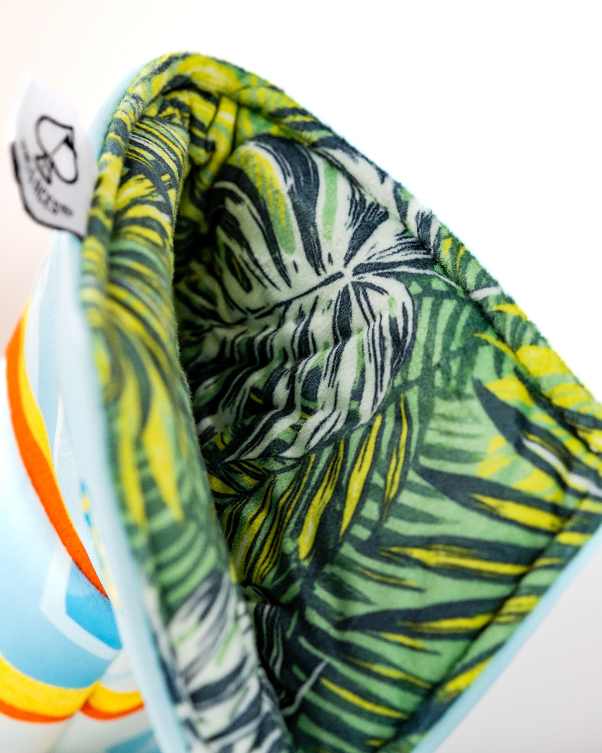 Vibrant Margaritaville Puddle Jumper blade putter cover featuring a tropical leaf interior design for stylish protection.