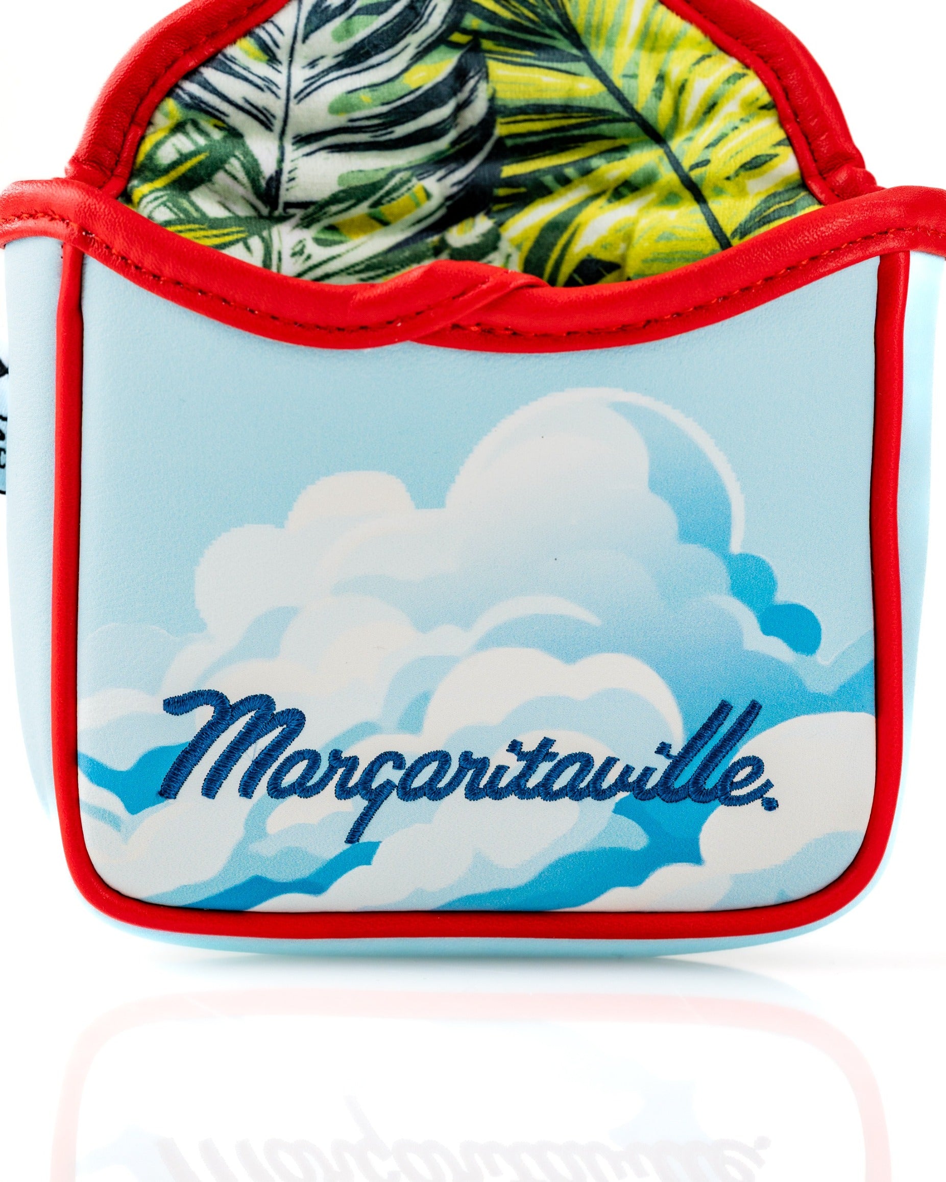 Margaritaville mallet putter cover featuring a blue cloud design and tropical leaf interior for stylish golf protection.