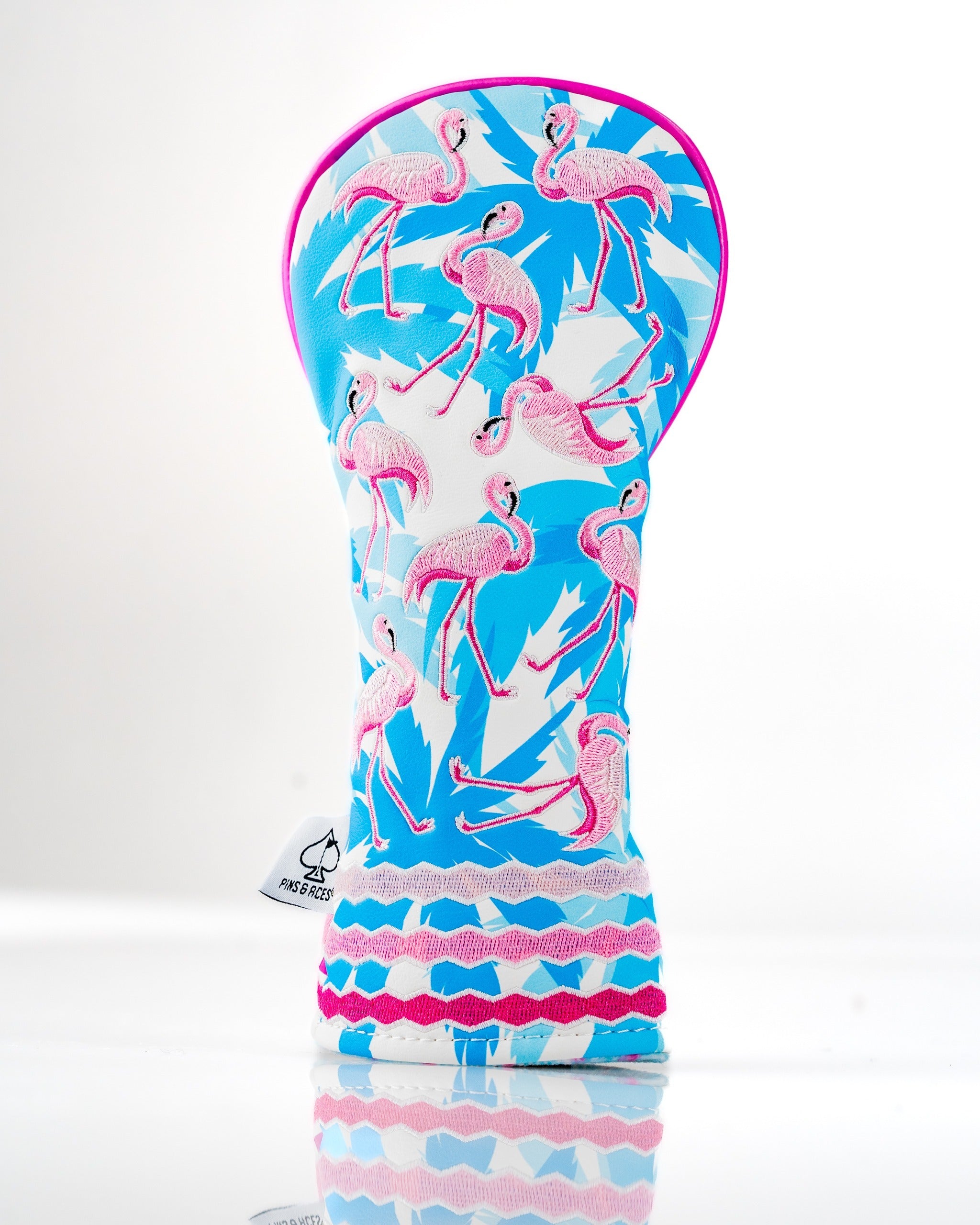 Colorful hybrid golf club cover featuring a vibrant flamingo design on a blue and white background.