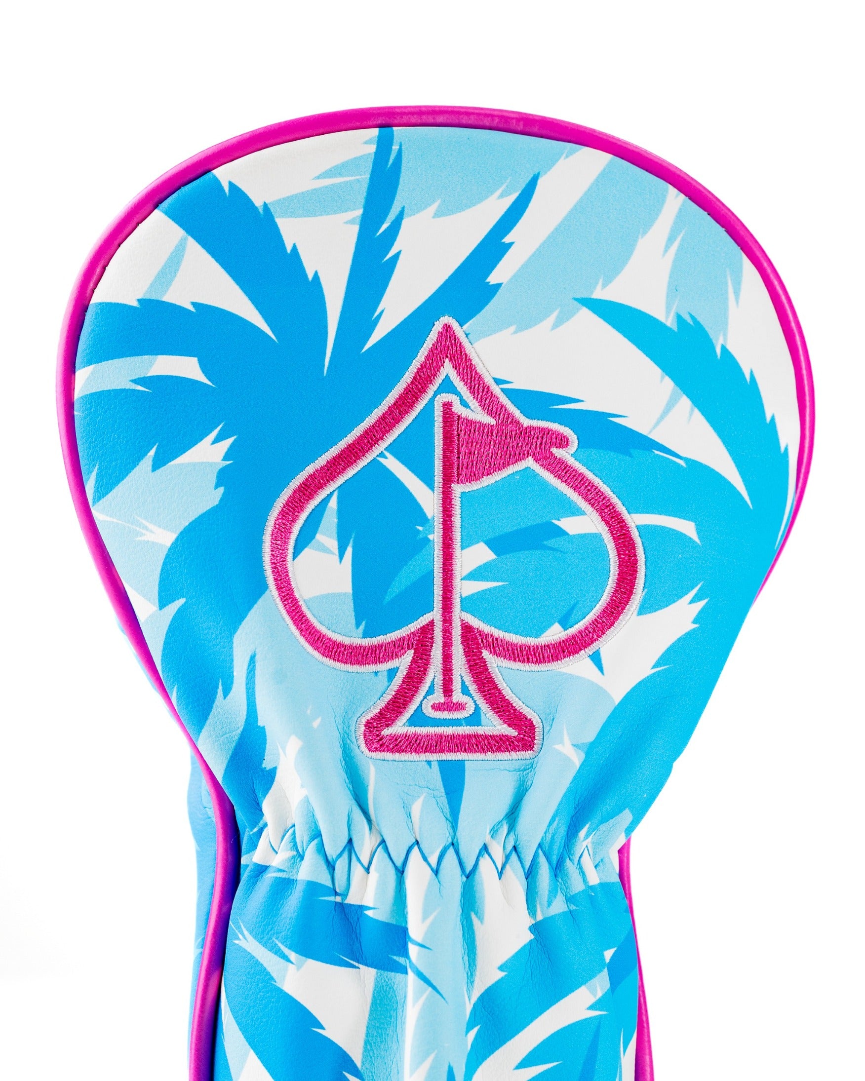 Vibrant flamingo-themed fairway cover featuring a blue palm leaf design and a pink spade logo for stylish golf protection.