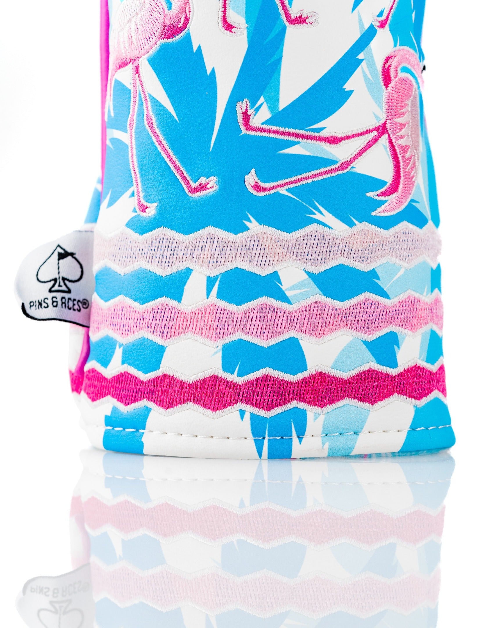 Vibrant fairway cover featuring a flamingo design in pink and blue, perfect for adding style to your golf game.