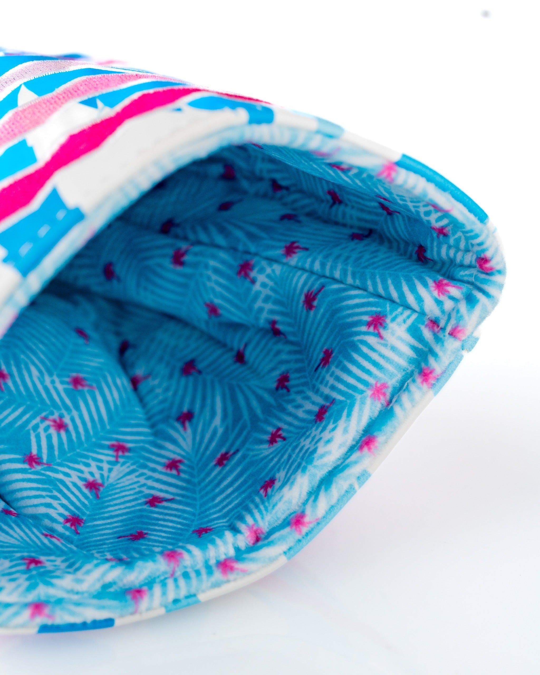 Flamingo Flock driver cover featuring a vibrant design with pink flamingos and a blue palm leaf interior.