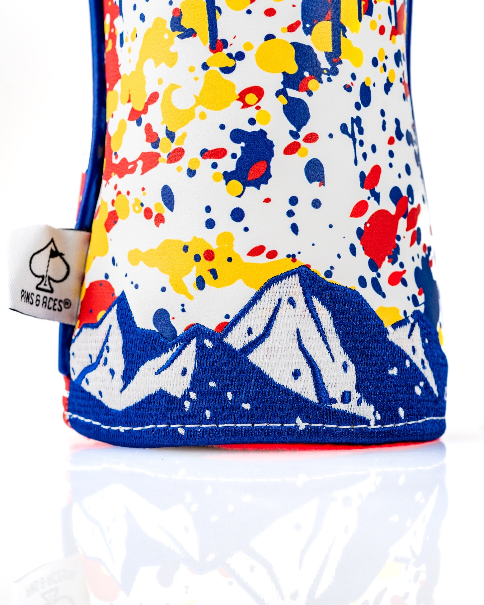 Colorful Colorado 2.0 fairway cover featuring a mountain design and vibrant splatter pattern for stylish golf protection.