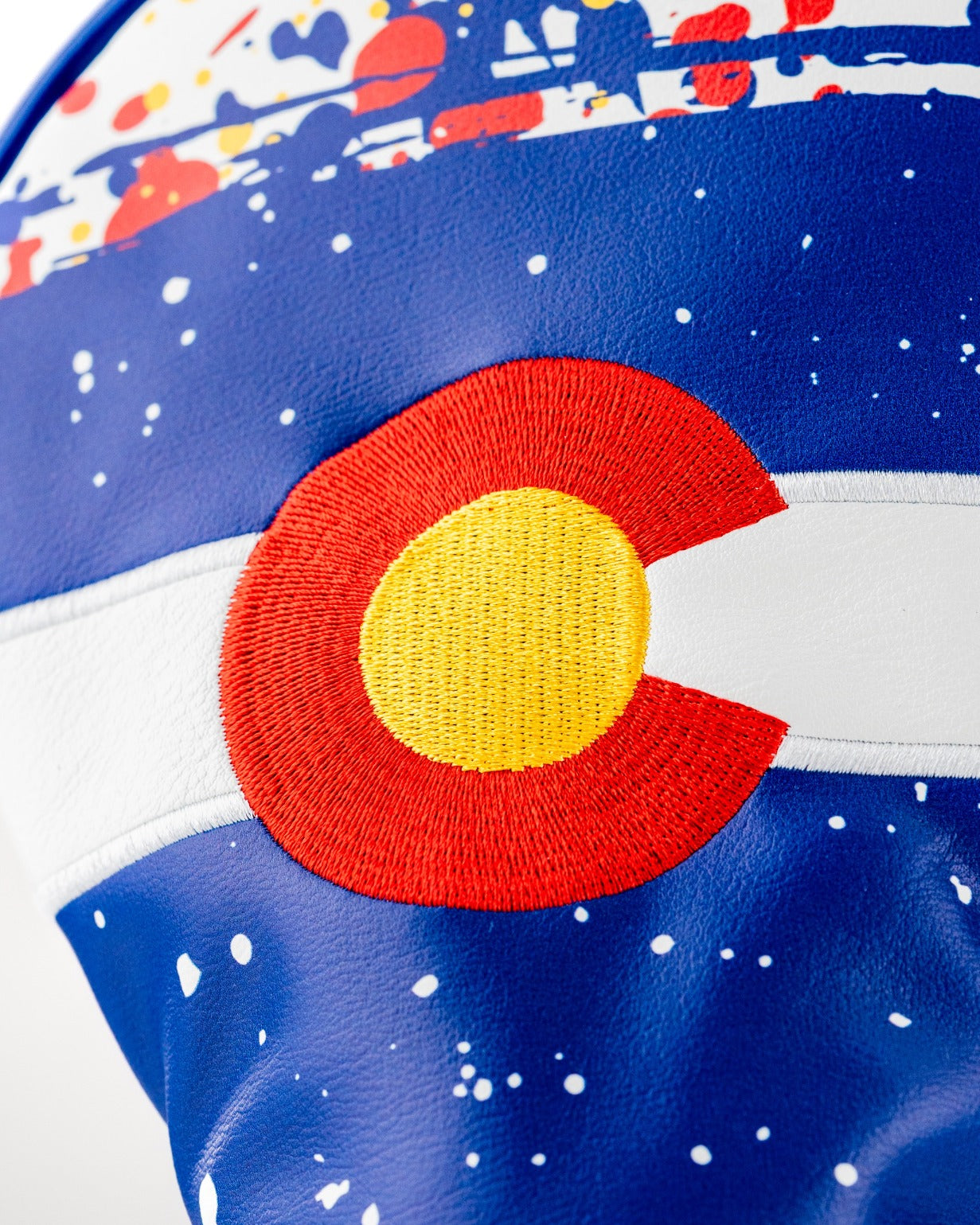 Bold Colorado 2.0 driver cover featuring vibrant colors and a distinctive embroidered state emblem for stylish golf protection.