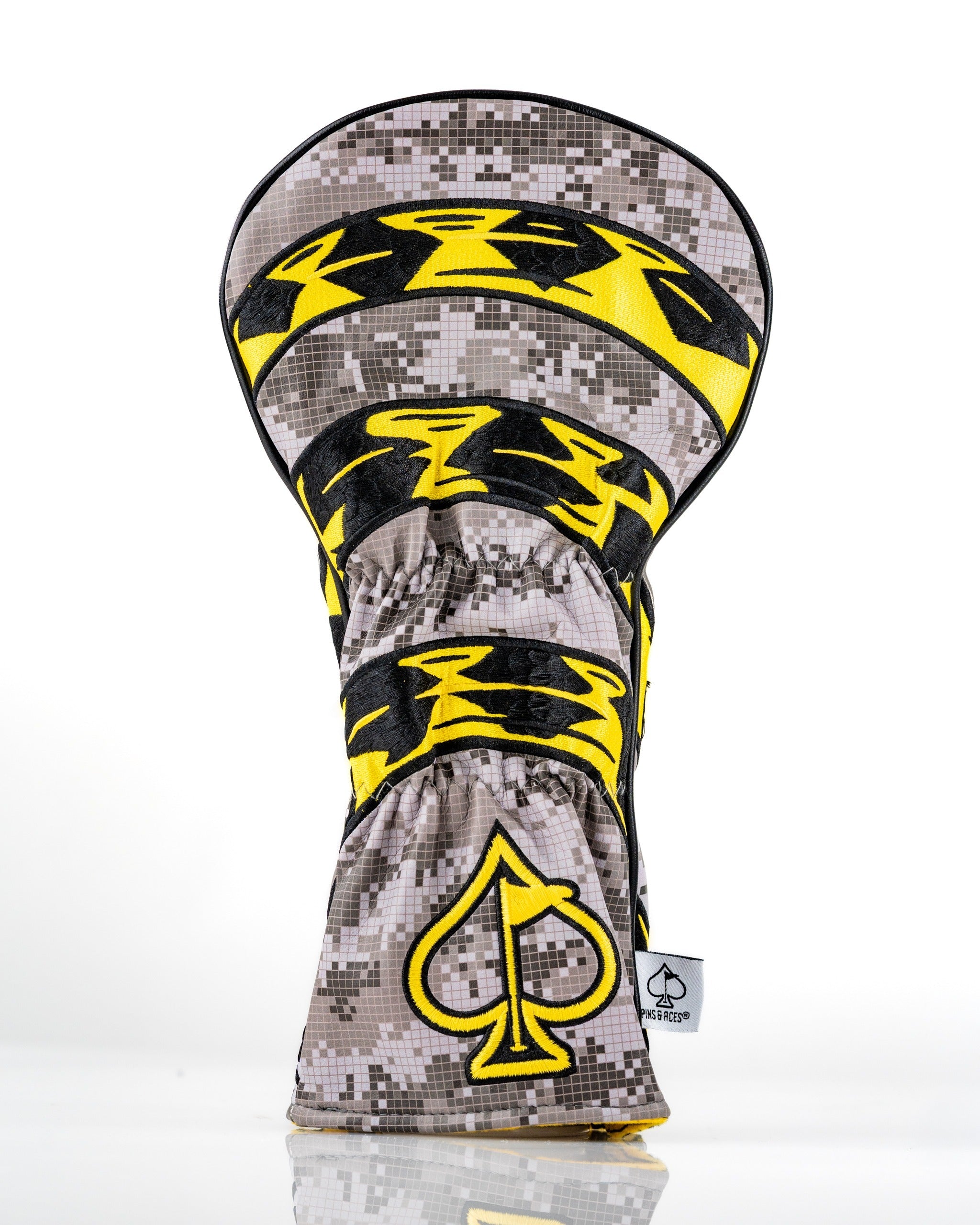 Bold camo driver cover featuring a striking yellow design and the iconic Don't Tread On Me emblem for standout style.
