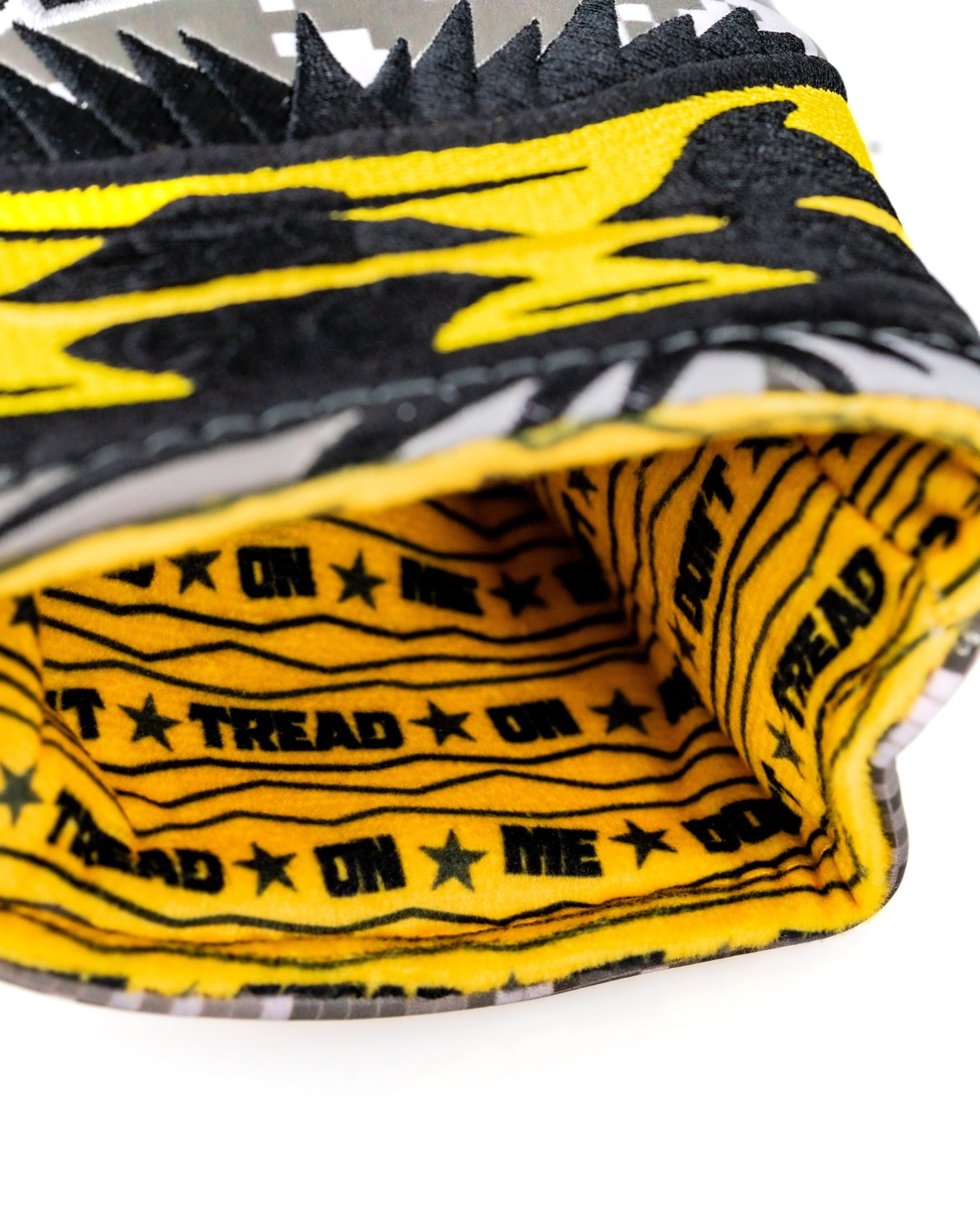Bold Don't Tread On Me 2.0 hybrid golf headcover featuring a striking yellow and black design with a soft interior lining.