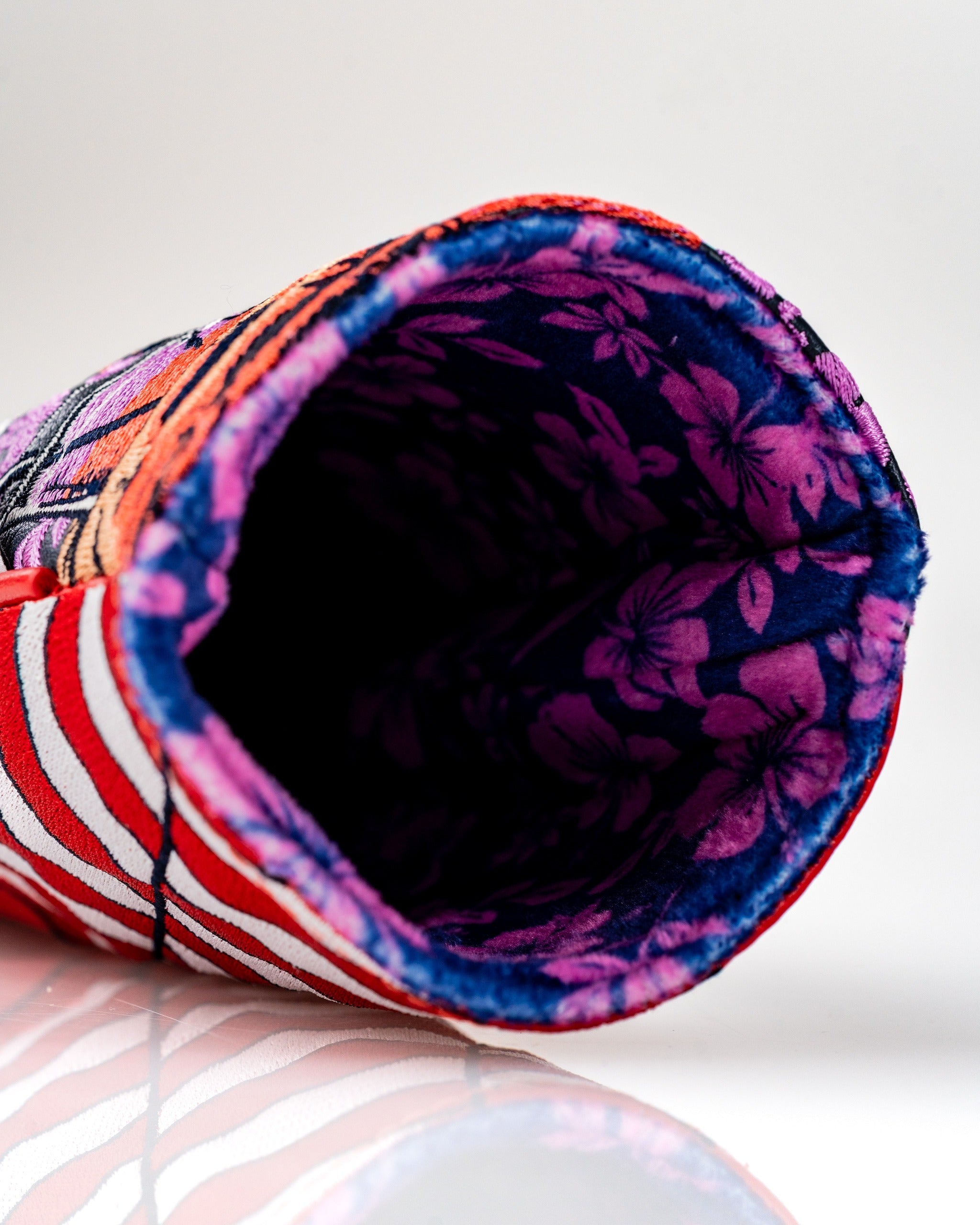 Colorful fairway cover featuring a bold design with stripes and floral patterns, perfect for adding style to your golf game.