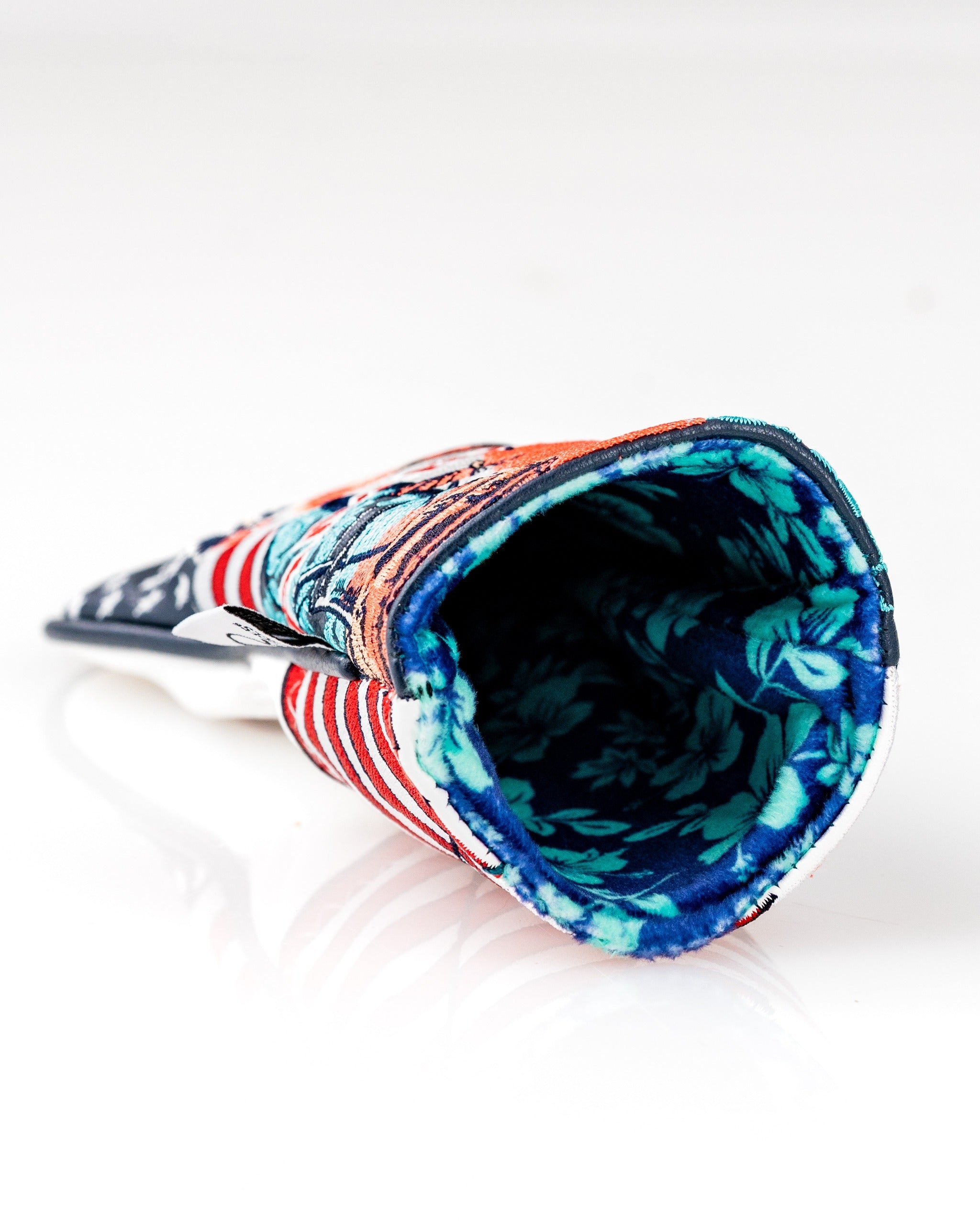 Colorful hybrid golf club cover featuring a floral interior and patriotic design, perfect for stylish golfers.
