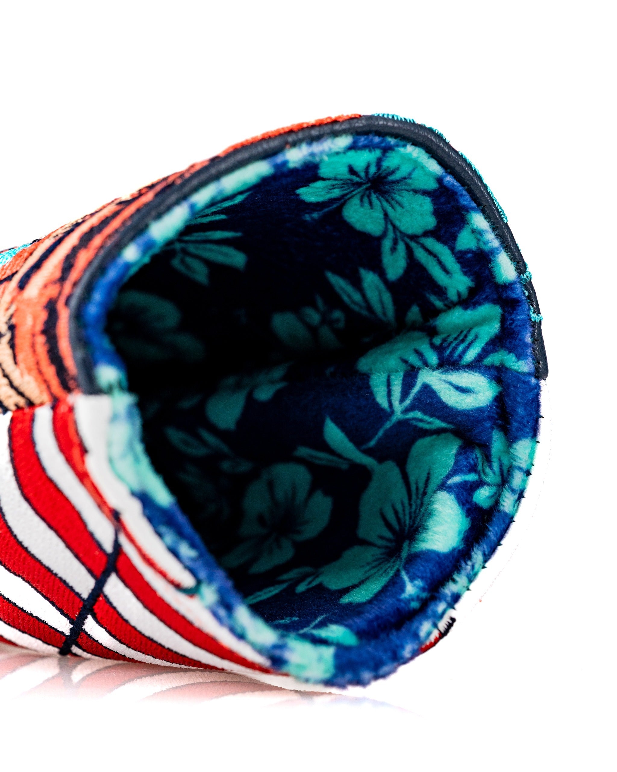Bold hybrid golf headcover featuring a vibrant floral interior and a patriotic design, perfect for stylish golfers.