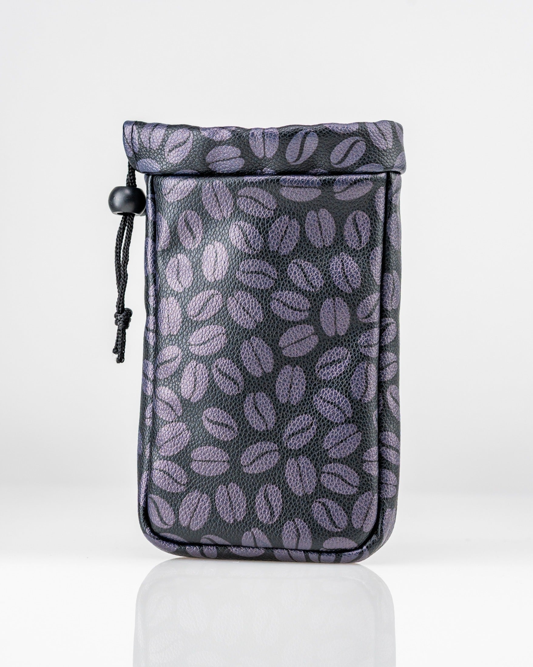 Valuables pouch featuring a stylish coffee bean pattern in purple and black, ideal for storing small items.