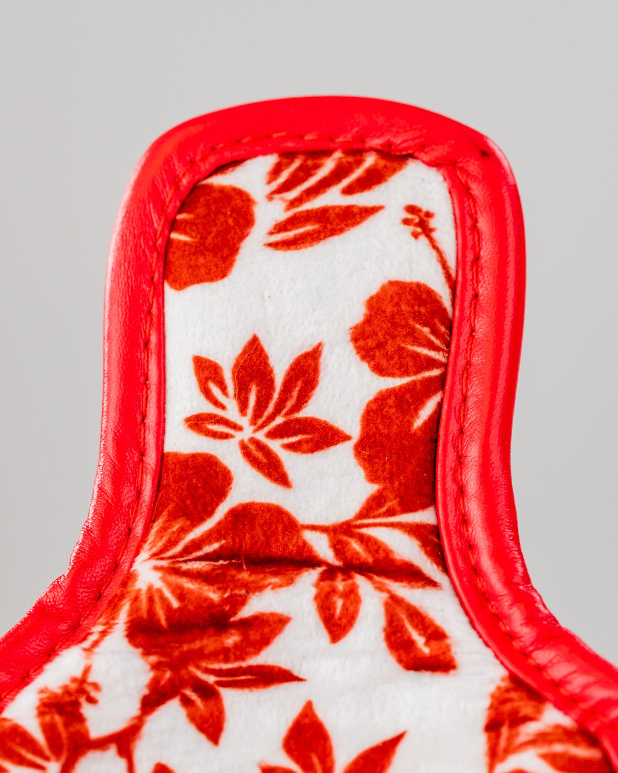 Bold mallet putter cover featuring a vibrant floral design in red and white, perfect for golfers seeking unique style.