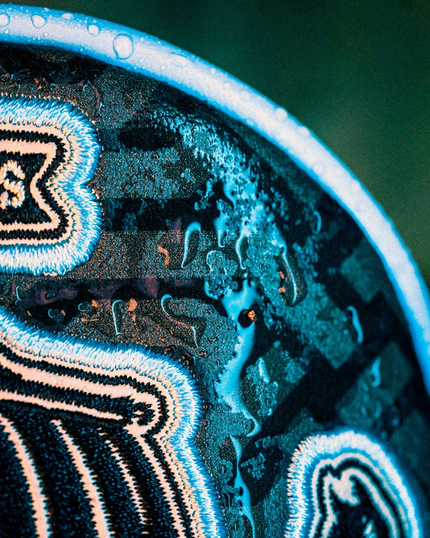 Close-up of a textured golf headcover with water droplets, showcasing intricate designs for the Black Friday 2025 Mystery Box.
