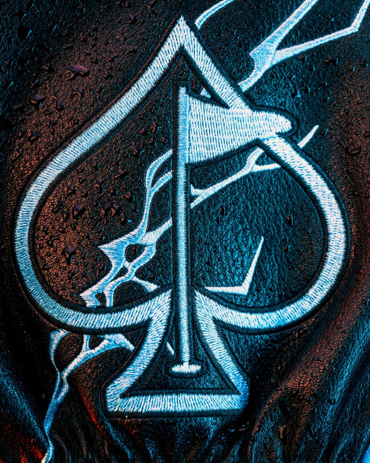 Black Friday 2025 Mystery Box featuring a sleek black design with a prominent embroidered spade logo.