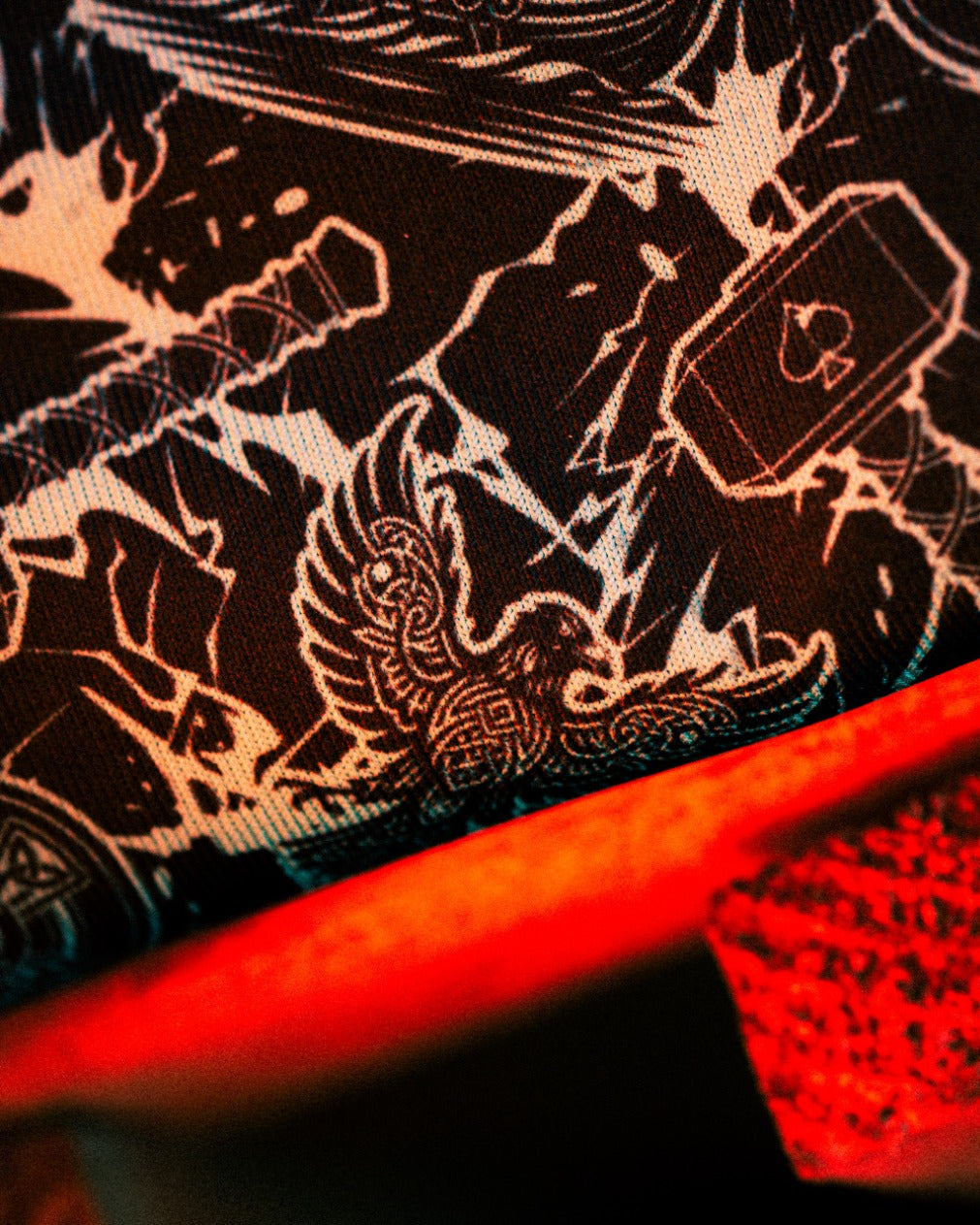 Intricate black and white pattern featuring mythical elements, hinting at the contents of a mystery box for Black Friday 2025.