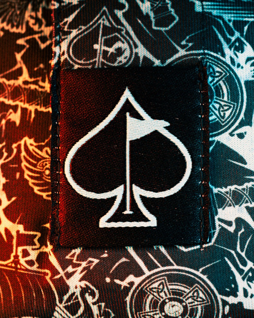 Black Friday 2025 Mystery Box featuring a bold spade logo on a patterned fabric background, perfect for unique golf apparel.