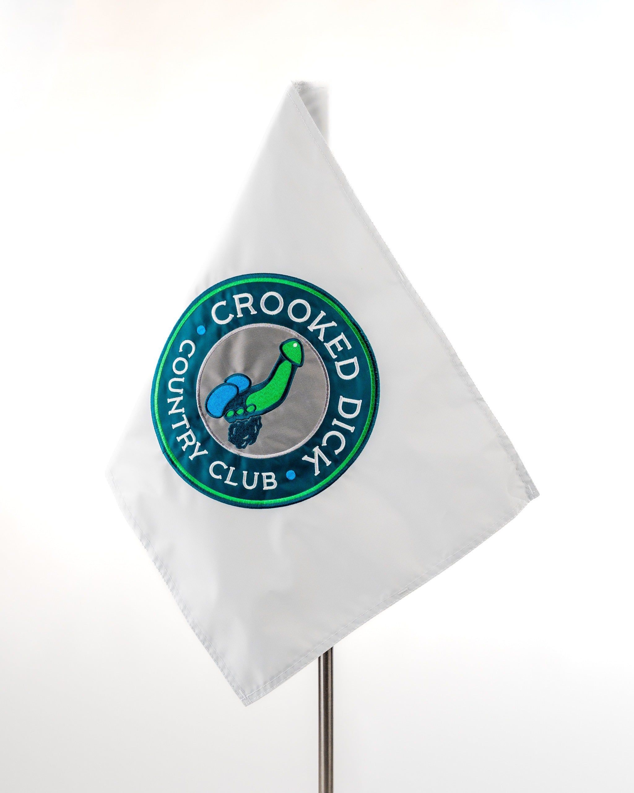 White golf flag featuring a colorful logo with the text "CROOKED DICK COUNTRY CLUB" and a playful graphic design.