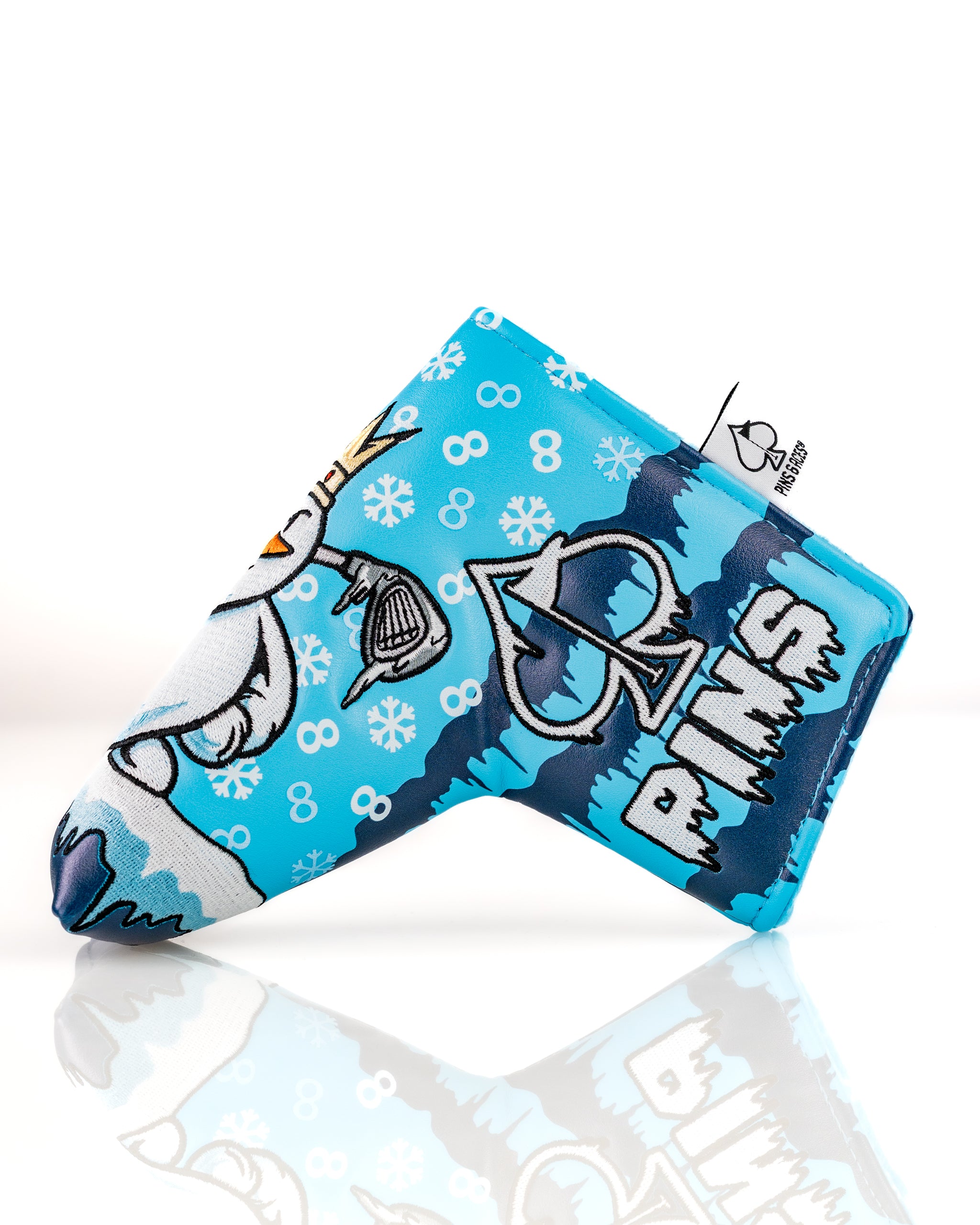 Colorful snowman blade putter cover featuring a playful design with snowflakes, perfect for adding personality on the golf course.