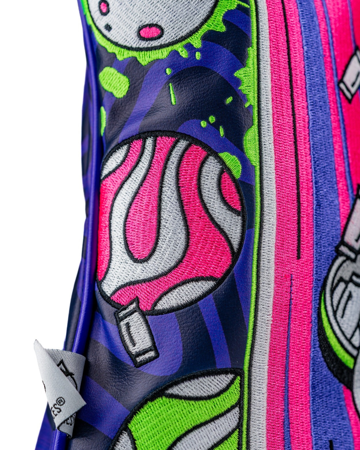 Bold alien-themed driver cover featuring vibrant colors and playful designs, perfect for golfers wanting to stand out.