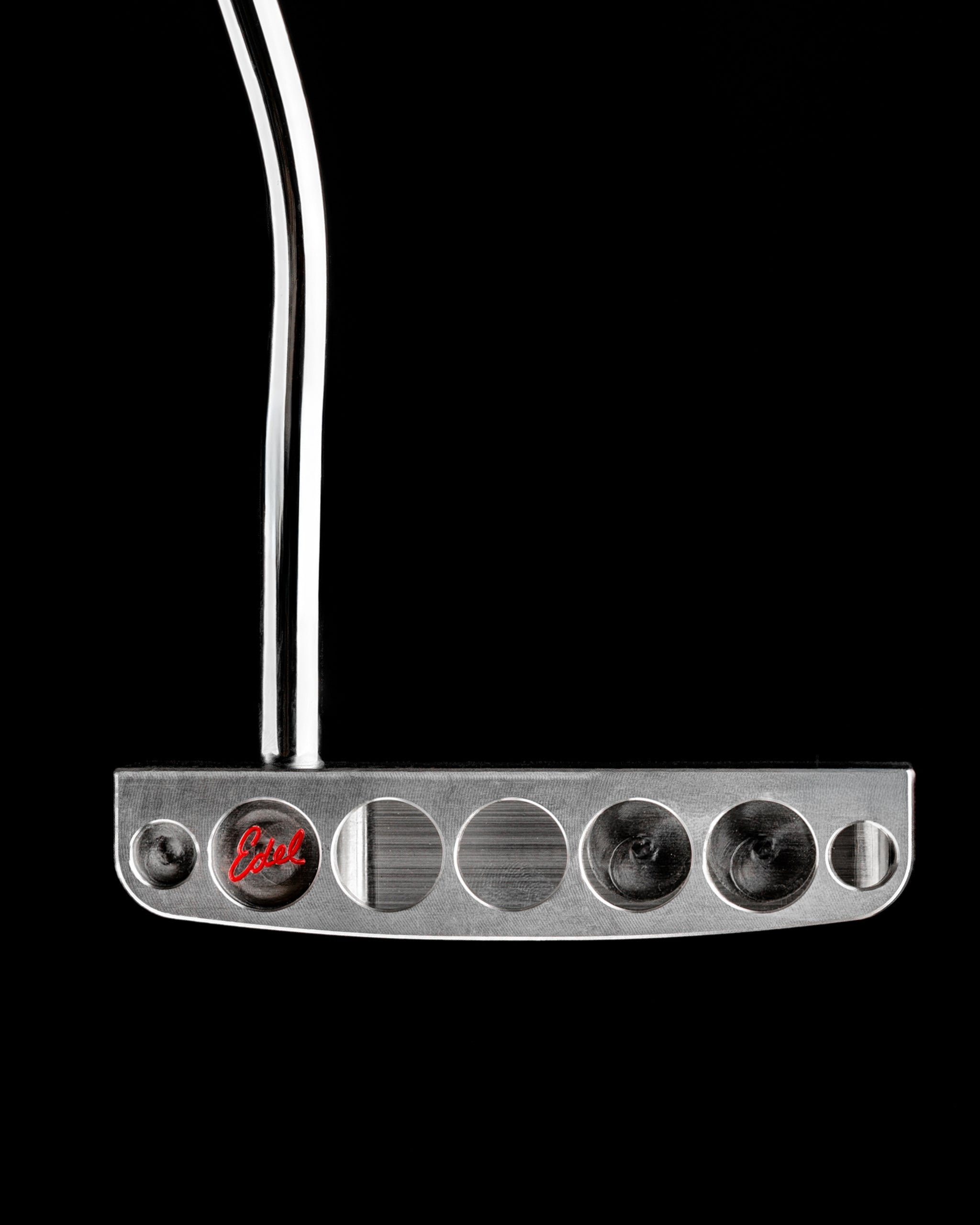 Sleek Edel Golf Blade Putter with a polished silver finish and distinctive alignment features for precision putting.