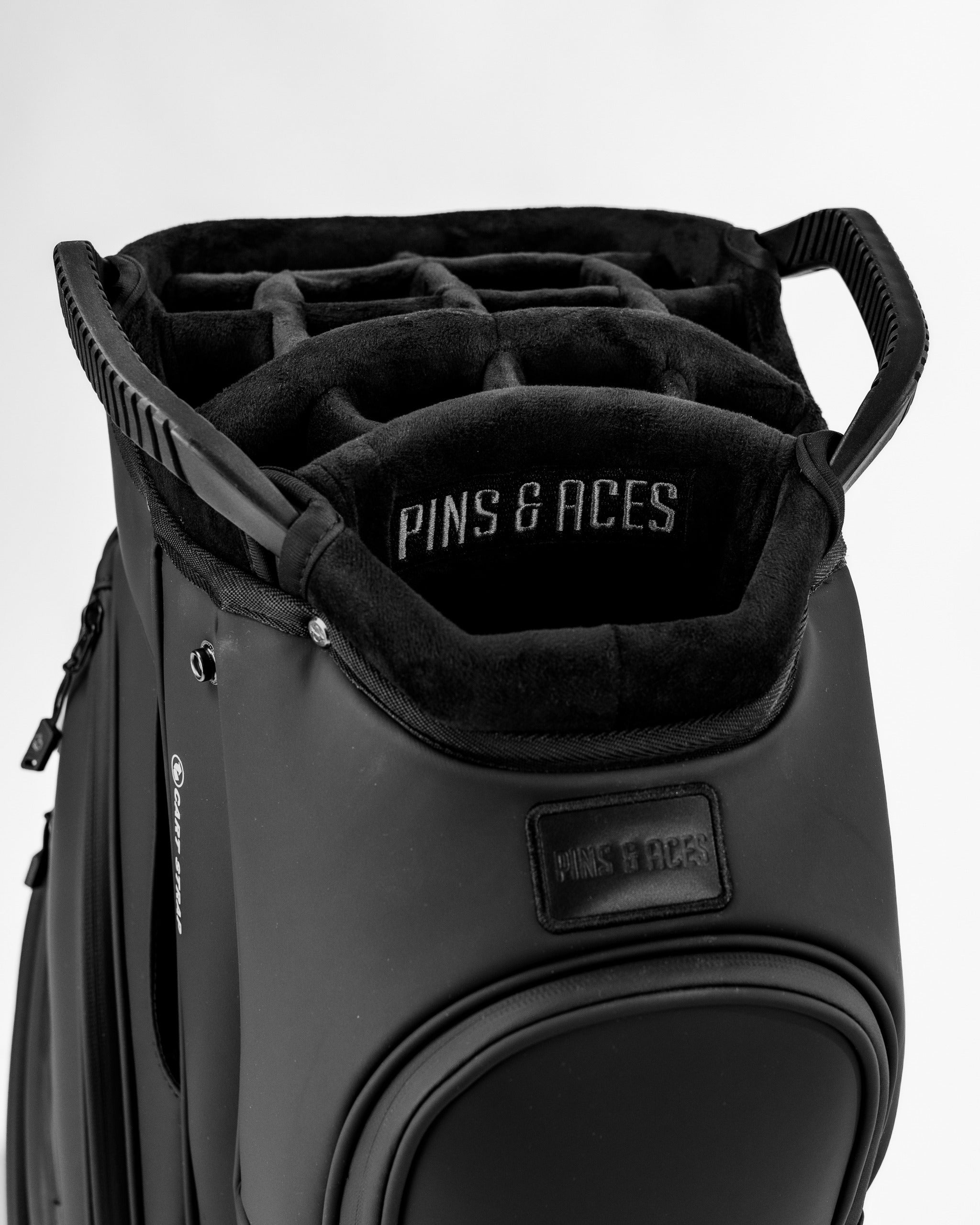 Black Player Preferred™ Cart Bag featuring a spacious top with dividers for organized club storage and a sleek design.