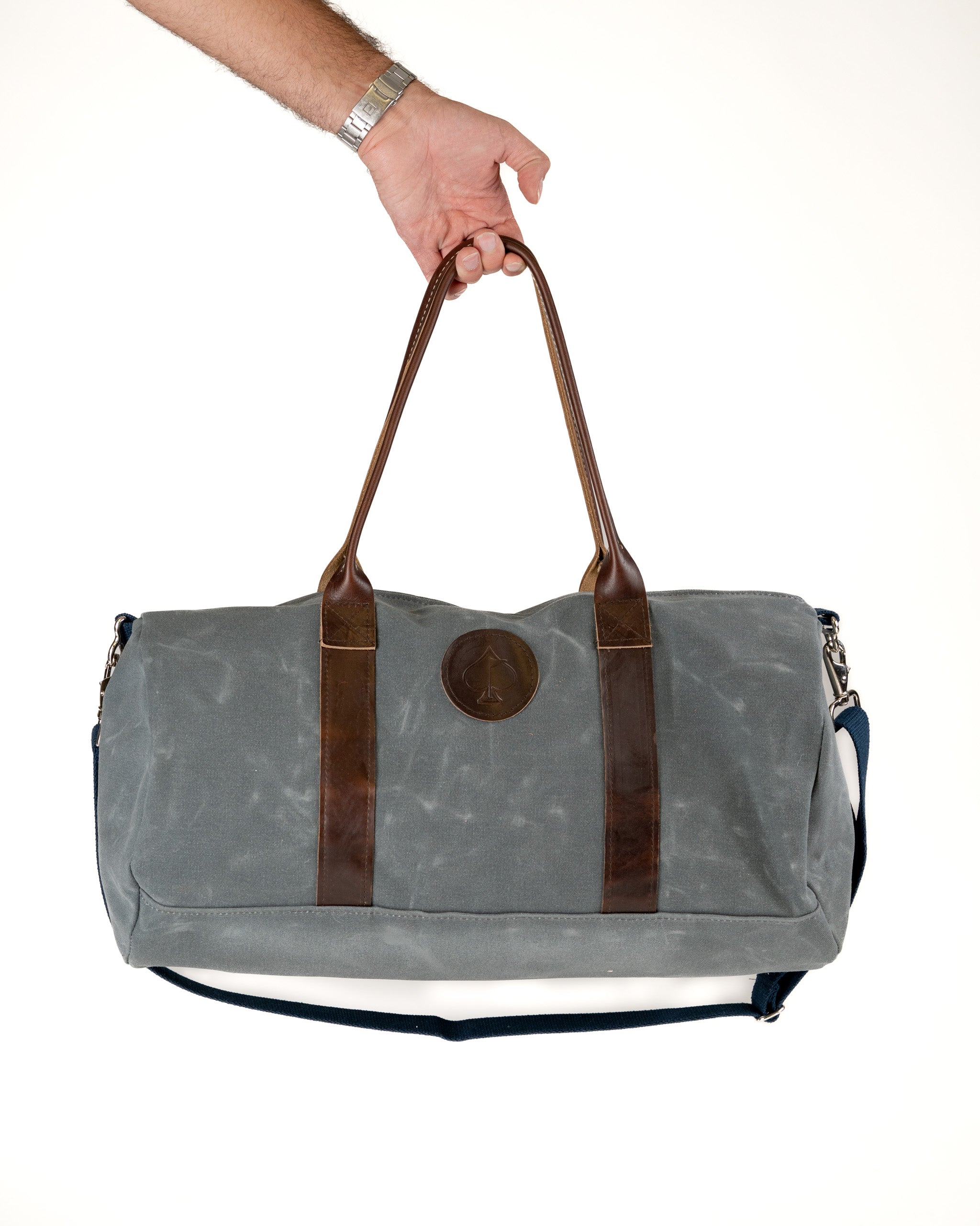 Stylish Black Friday duffel bag with leather handles, perfect for travel or gym use, showcasing a modern design.