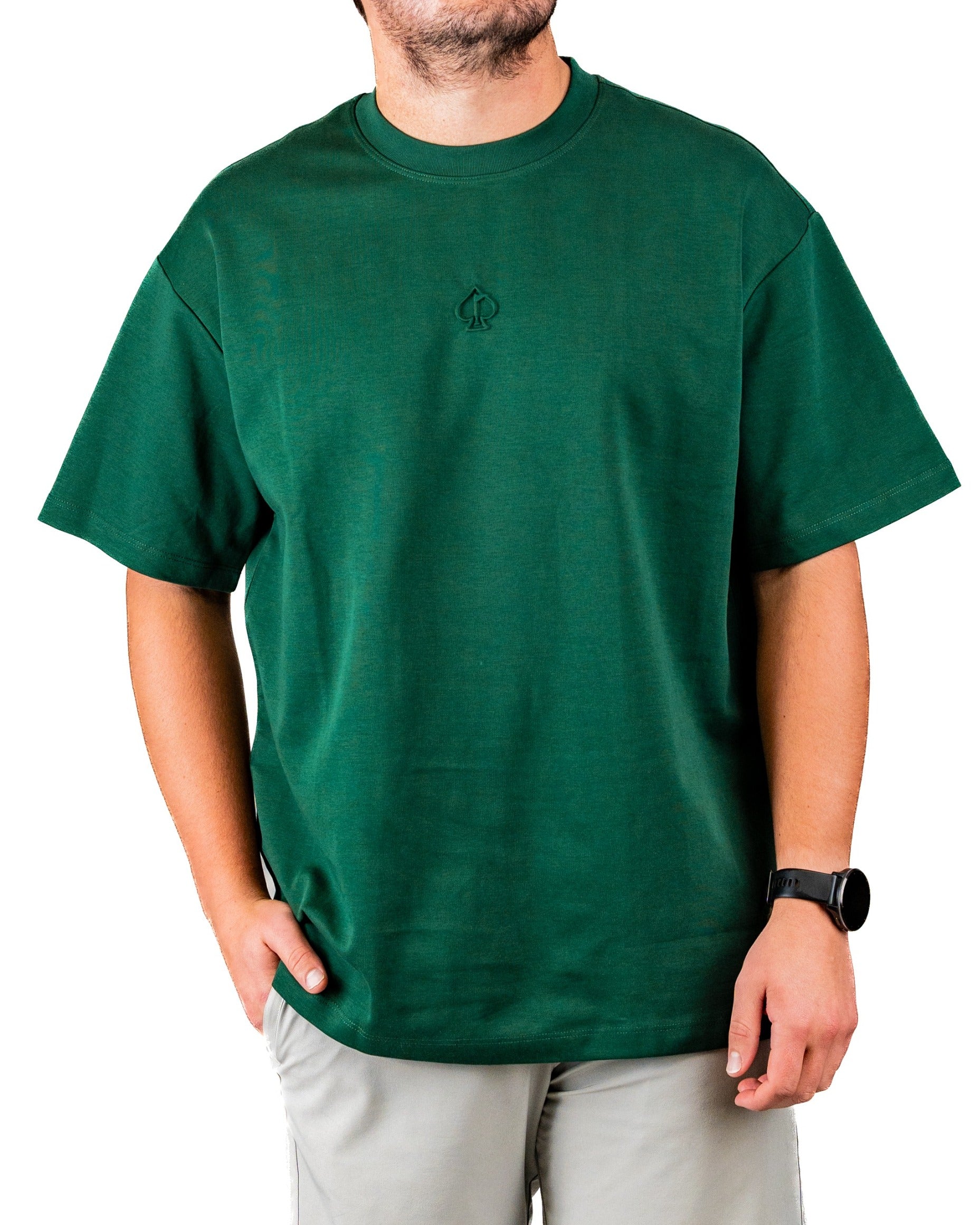 Men's green embossed spade tee shirt featuring a subtle logo, perfect for stylish comfort on and off the golf course.