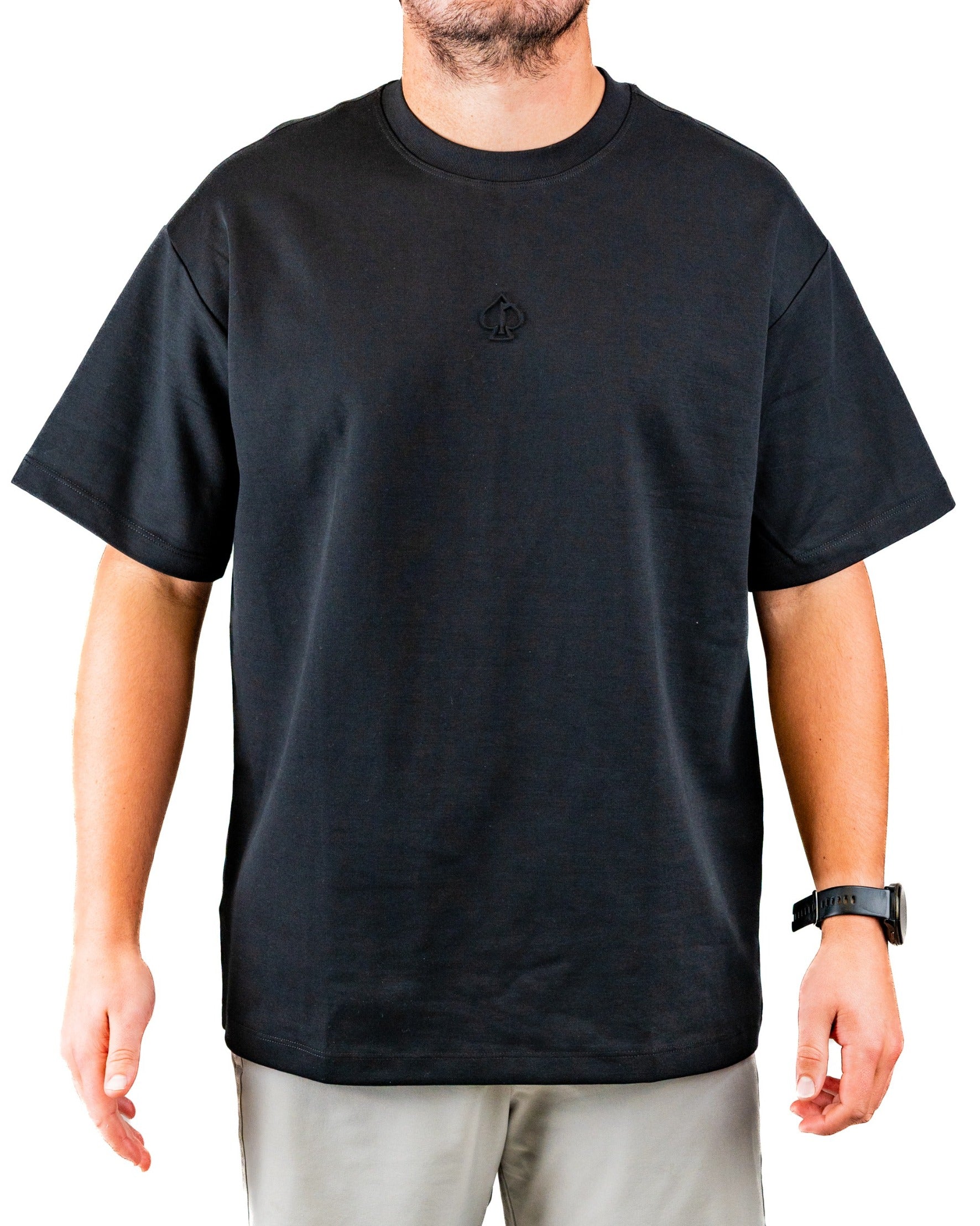 Black embossed spade tee shirt featuring a subtle logo on the chest, designed for a stylish and comfortable fit.