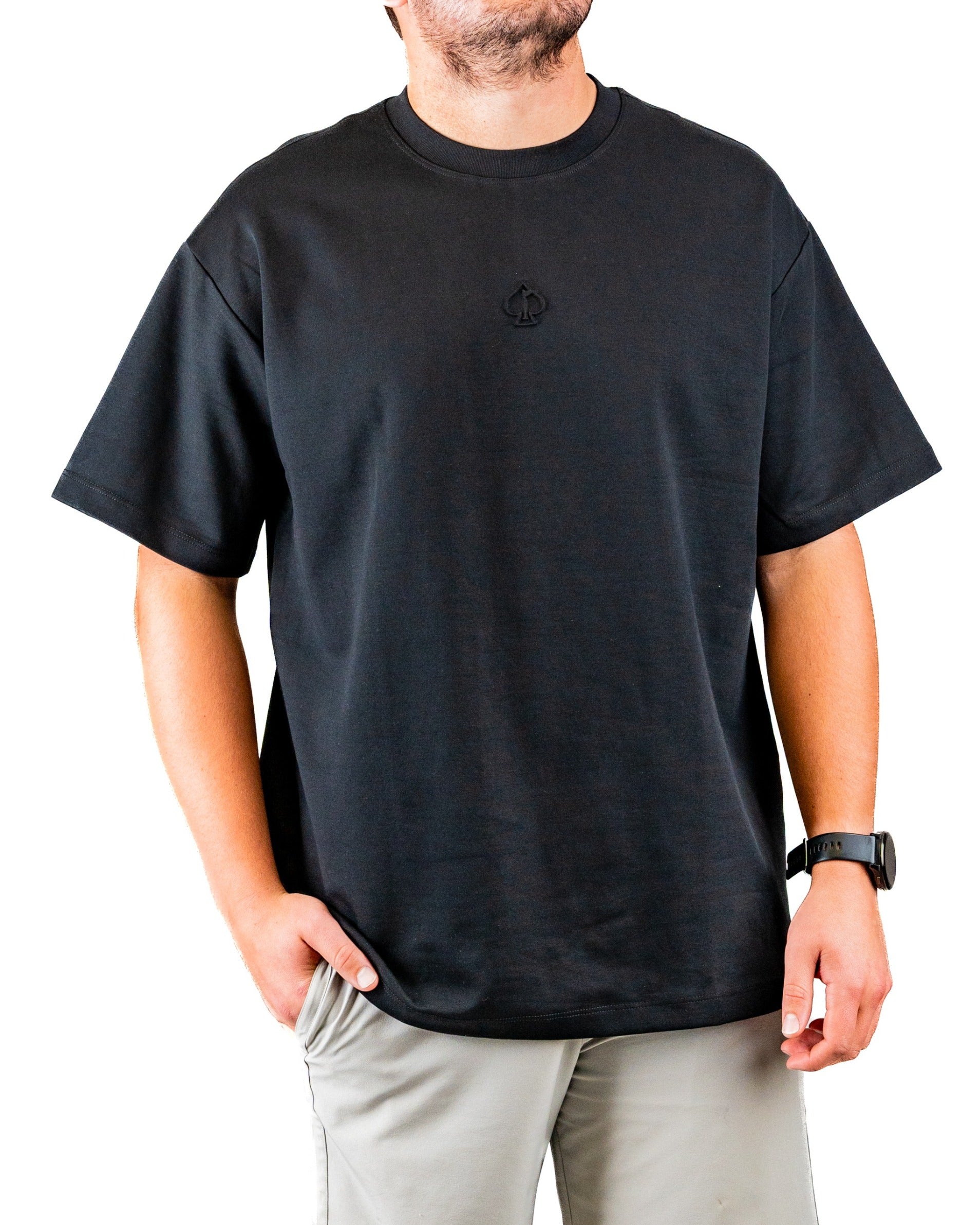 Black embossed spade tee shirt featuring a relaxed fit and subtle logo, perfect for stylish golfers on the course.
