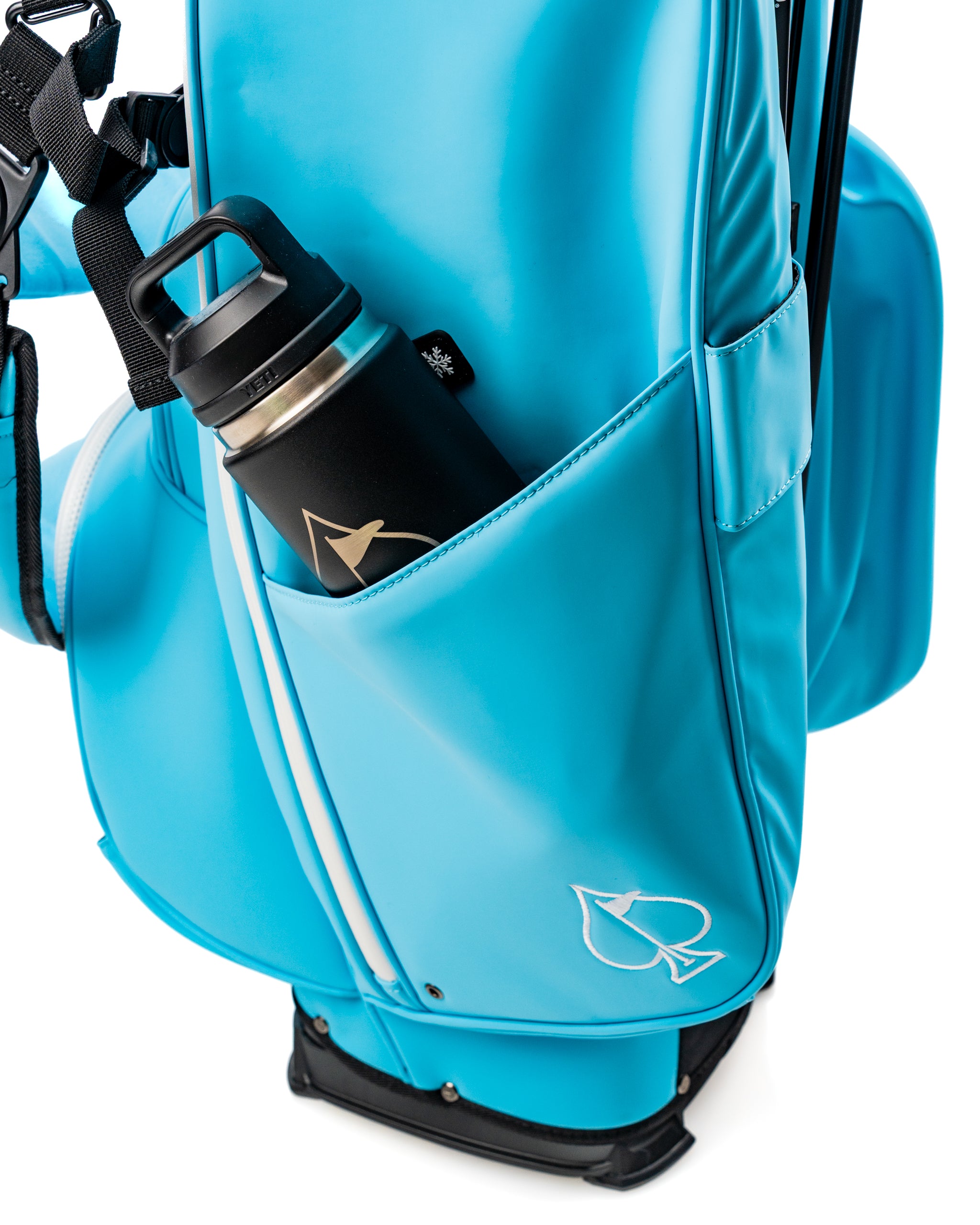Bright blue Player Preferred Golf Bag featuring a side pocket with a water bottle, designed for stylish golfers.