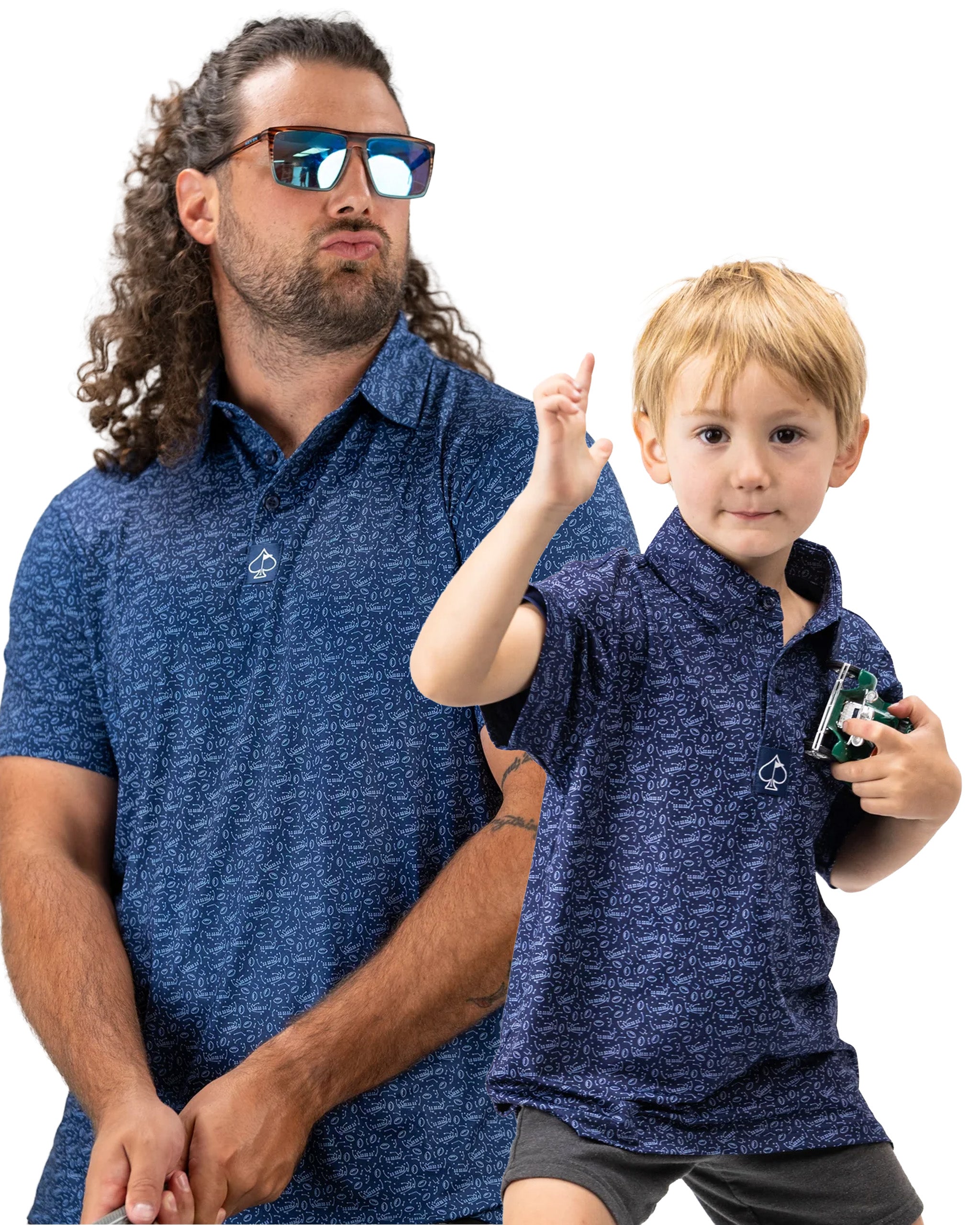 Father and son wearing matching blue patterned polos, showcasing a fun and stylish golf apparel bundle.
