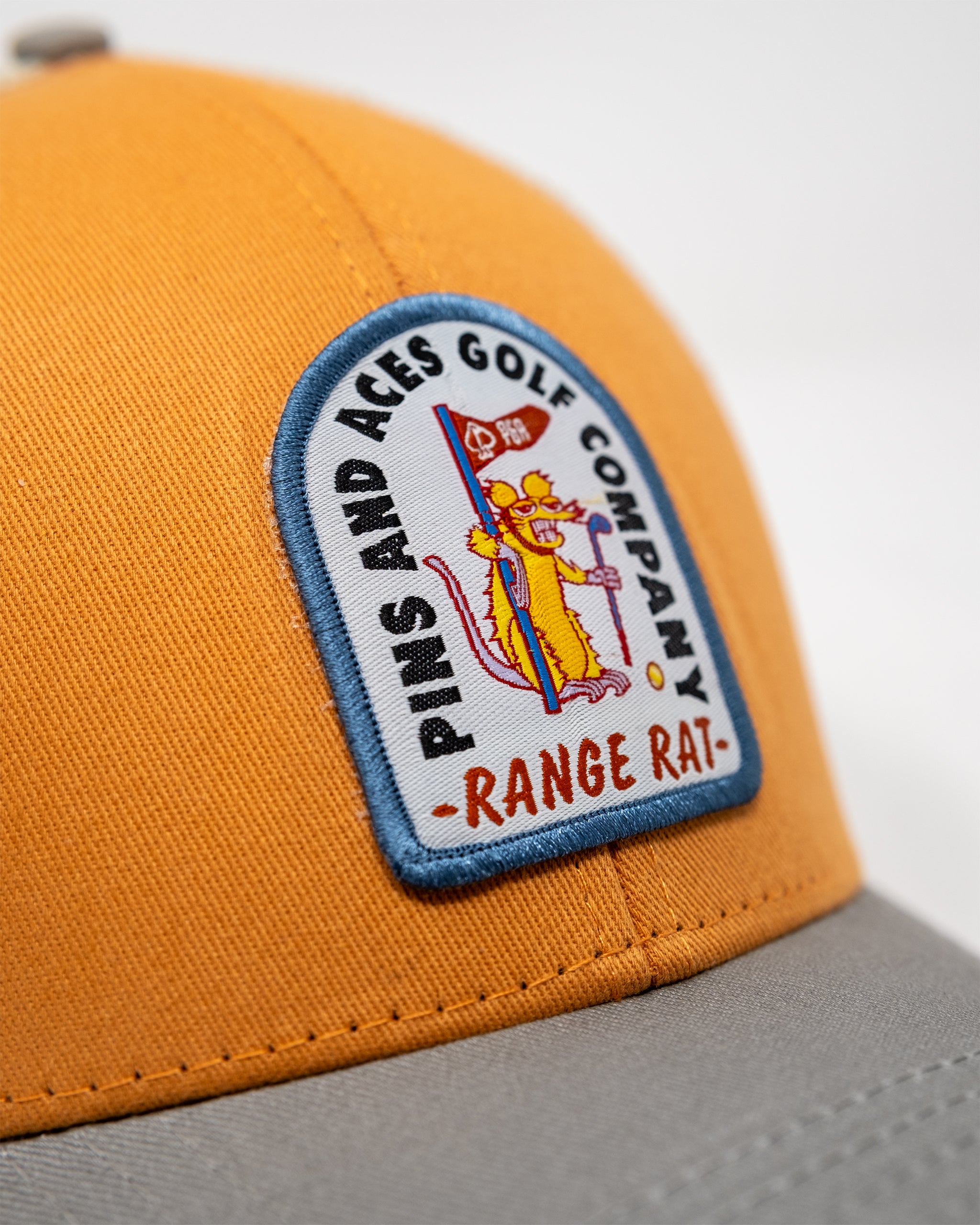 Range Rat Orange Trucker Snapback