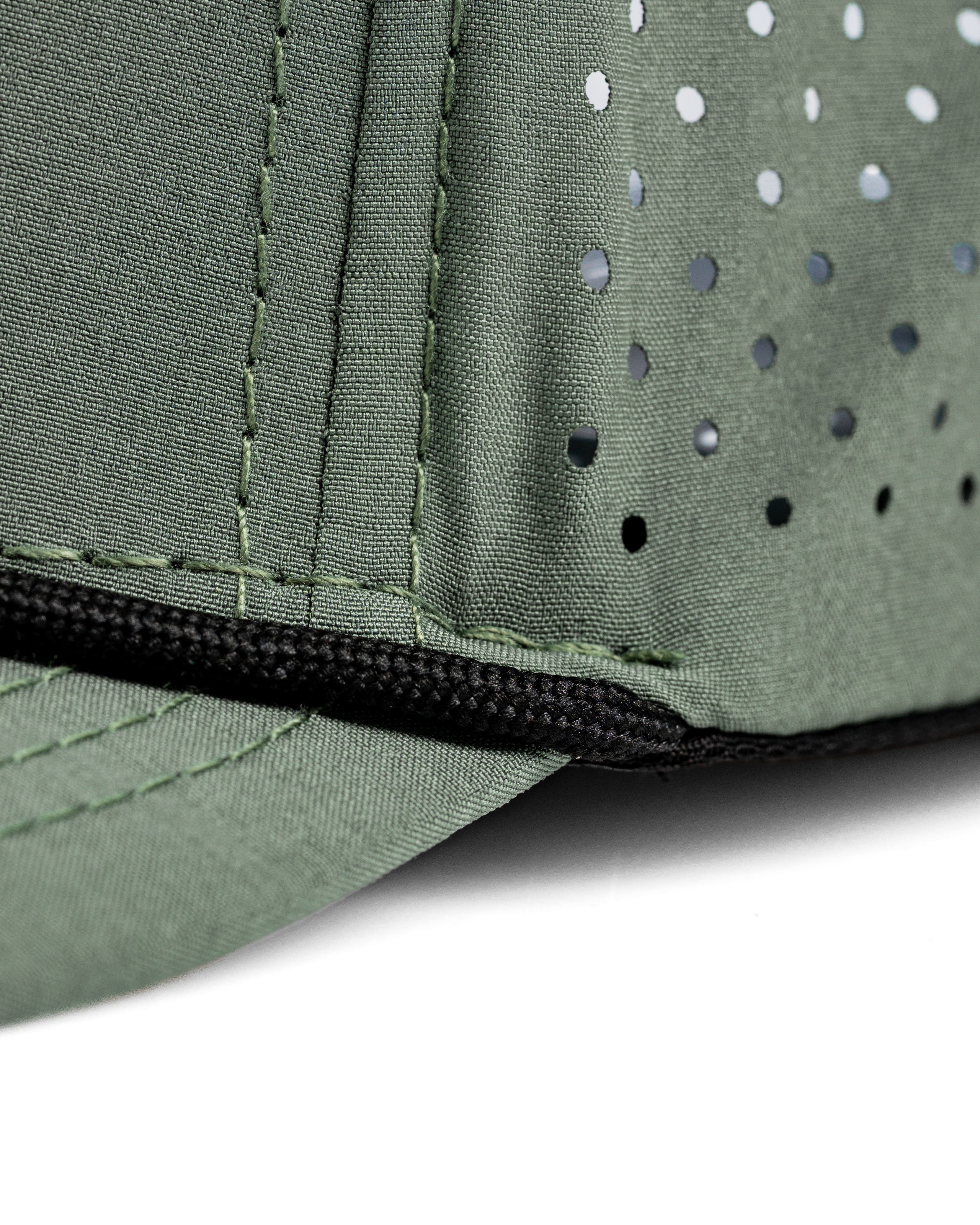 Perforated Rope Hat in green with stylish stitching and ventilation holes, ideal for golfers seeking a unique look.