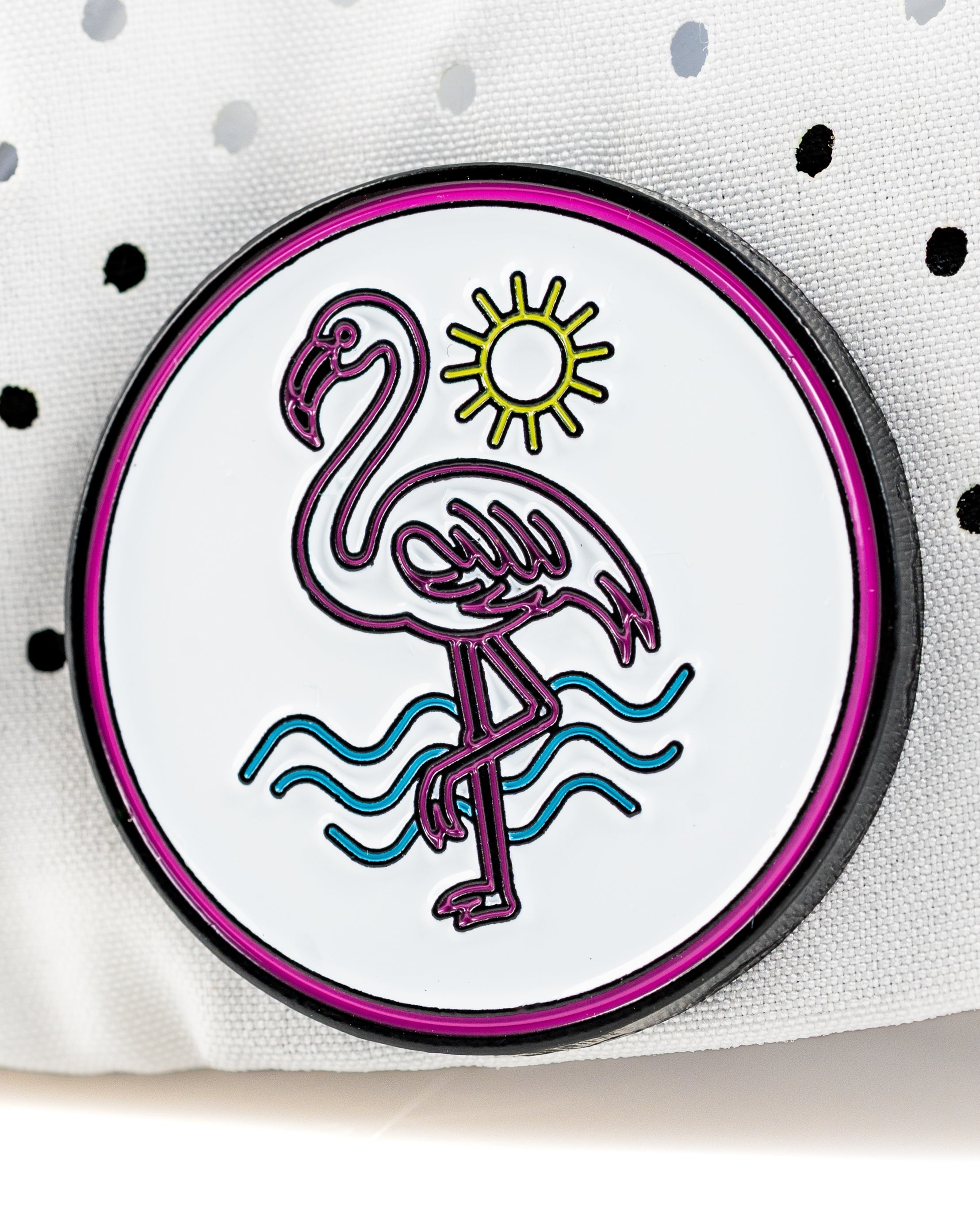 Perforated rope hat featuring a colorful flamingo patch with a sun and waves design, perfect for stylish golfers.