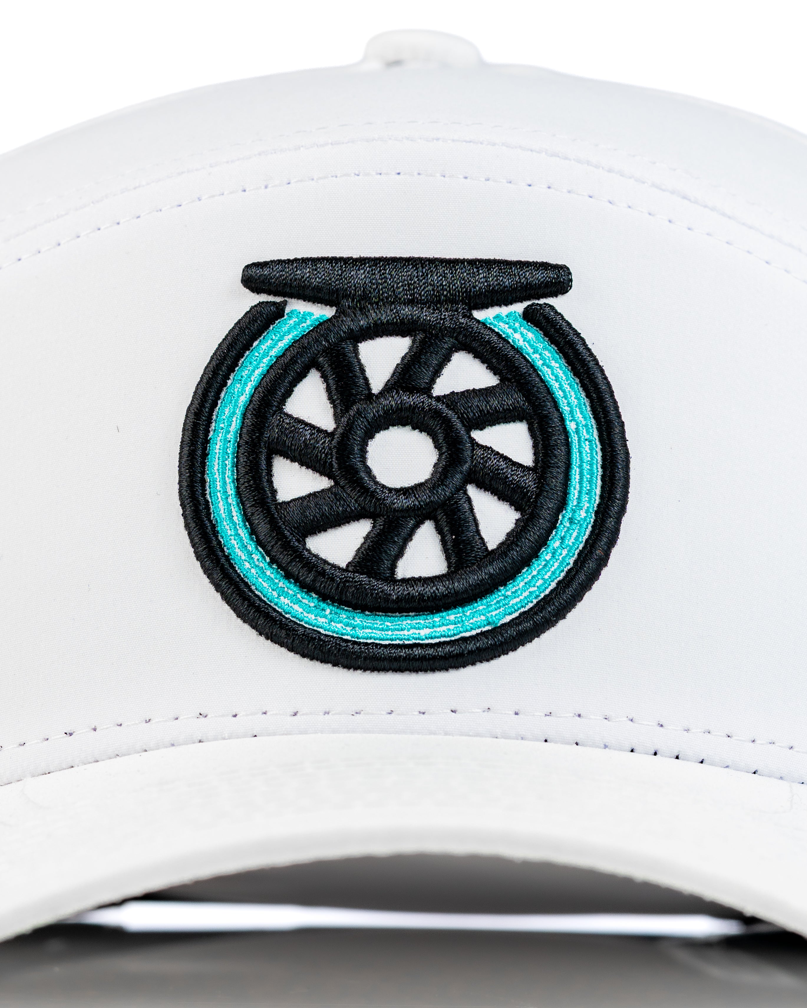 White Tradesman Hat featuring a bold embroidered reel logo in black and turquoise, perfect for stylish golfers.