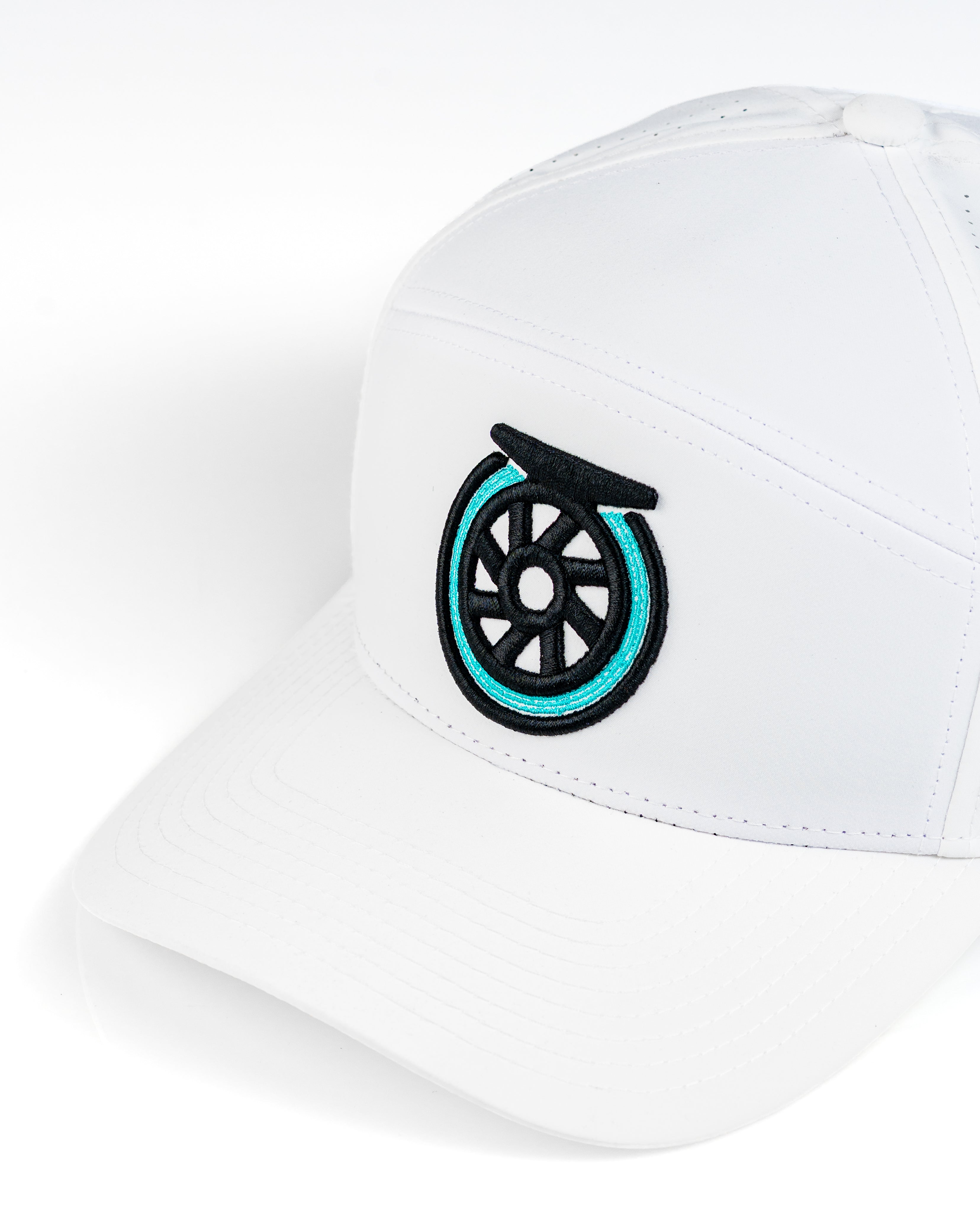 White Tradesman Hat featuring a bold embroidered reel logo, perfect for stylish golfers on the course.