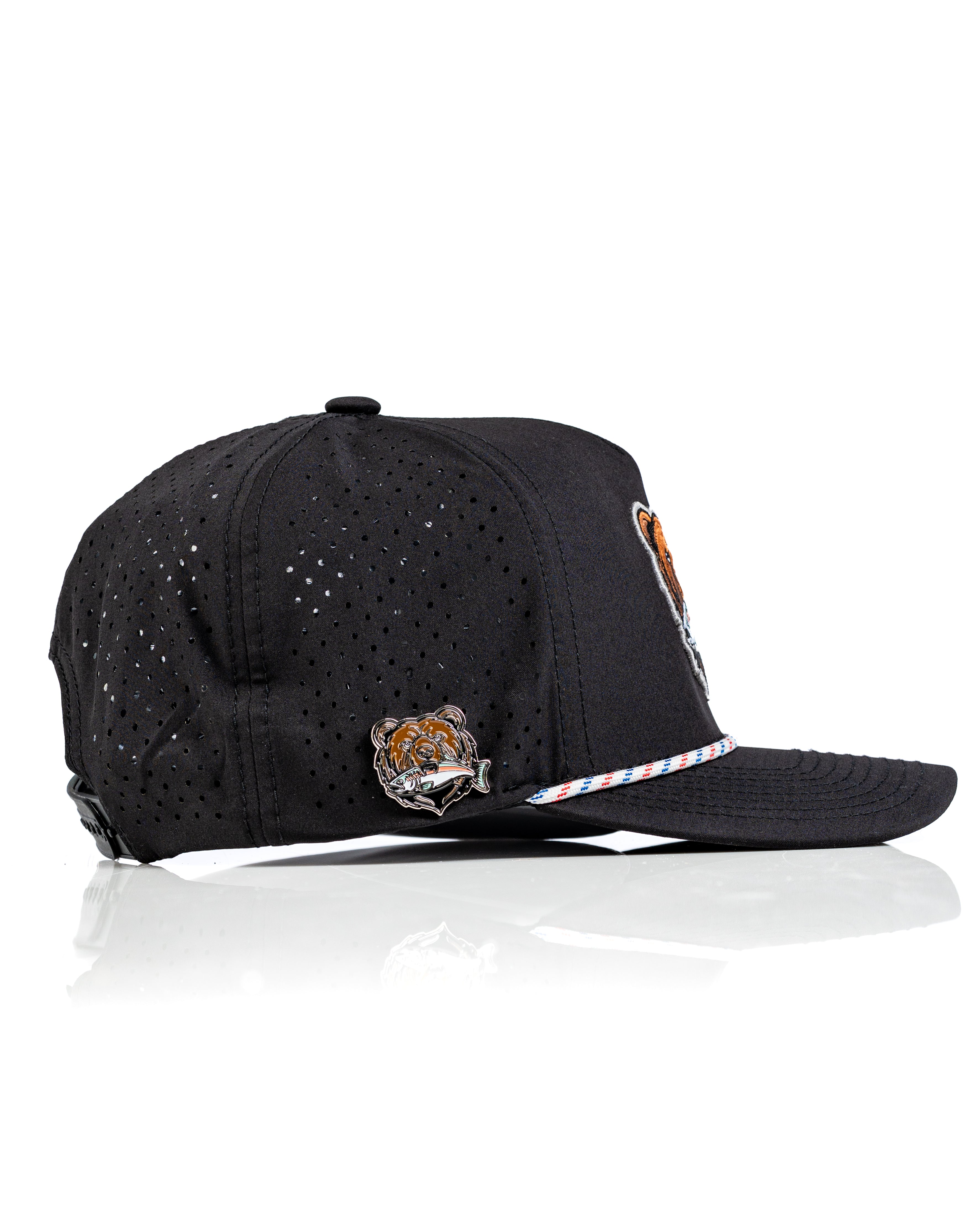 Perforated black rope hat featuring a Grizzly bear design and colorful detailing for a bold golf look.