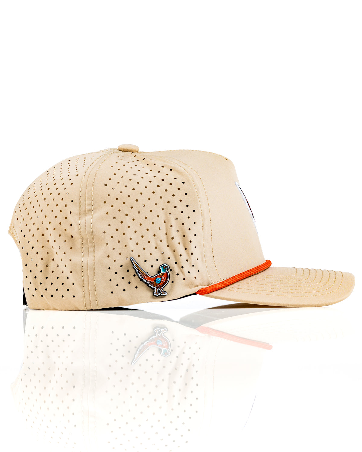 Beige perforated rope hat featuring a colorful pheasant logo and contrasting orange trim for a stylish golf accessory.