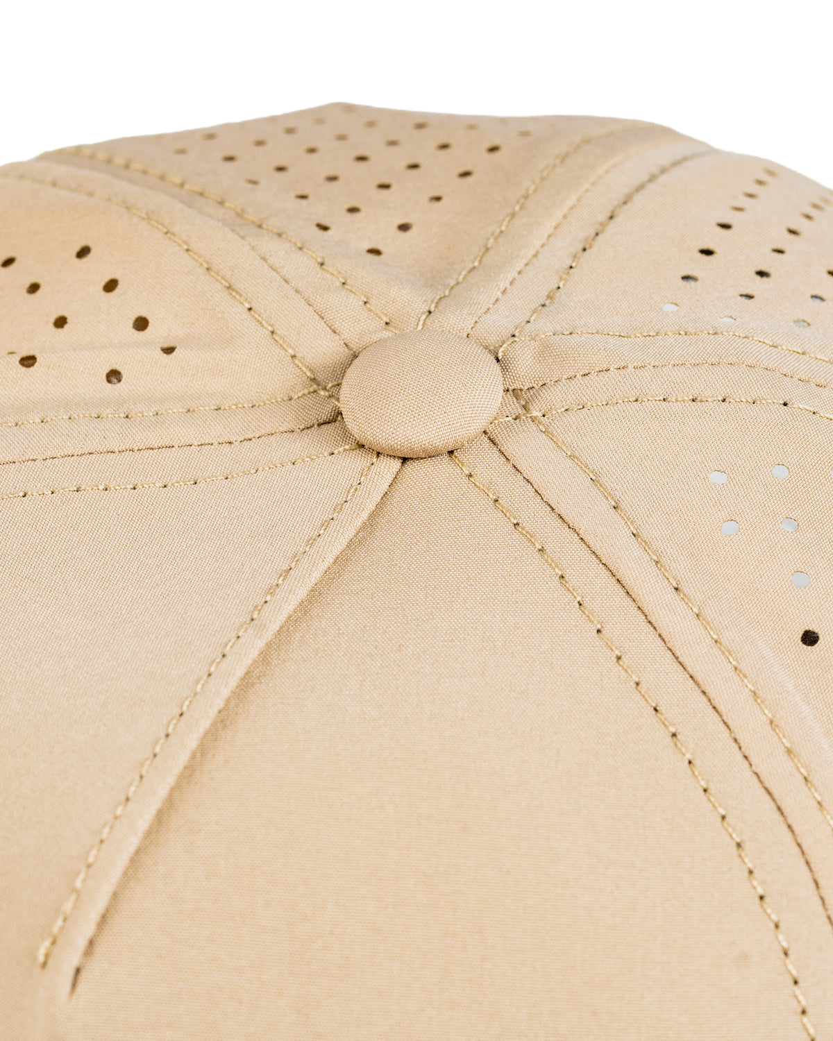 Perforated rope hat in a light tan color featuring a stylish design and ventilation holes for breathability.