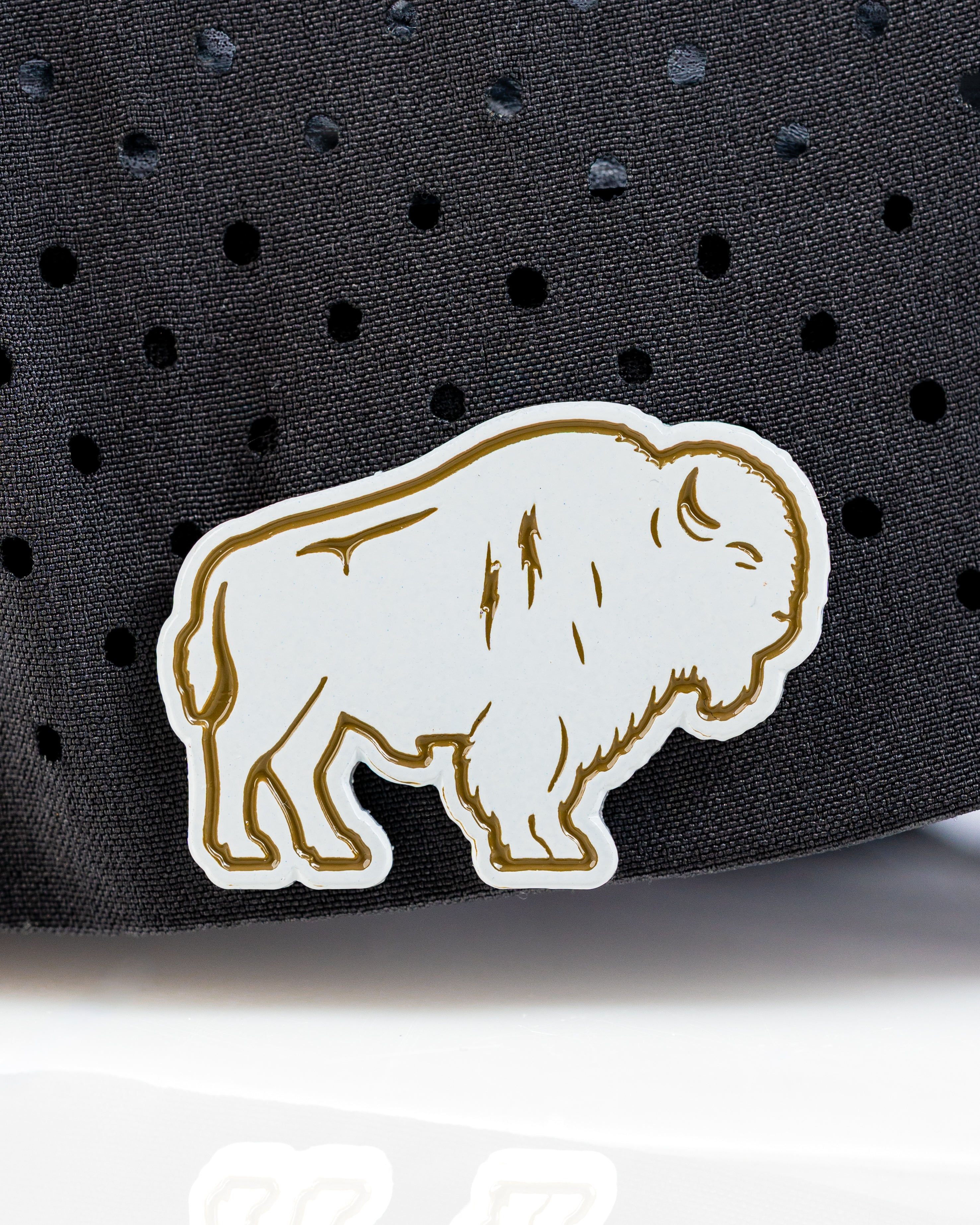 Perforated Rope Hat featuring a Great White Buffalo design, perfect for golfers seeking bold style on the course.