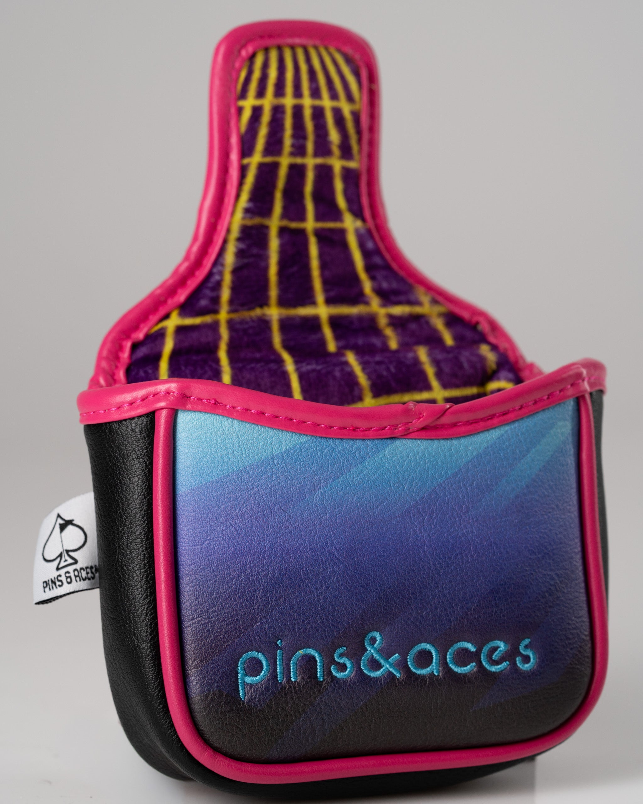 Bold Synthwave mallet putter cover featuring vibrant colors and retro design, perfect for stylish golfers.