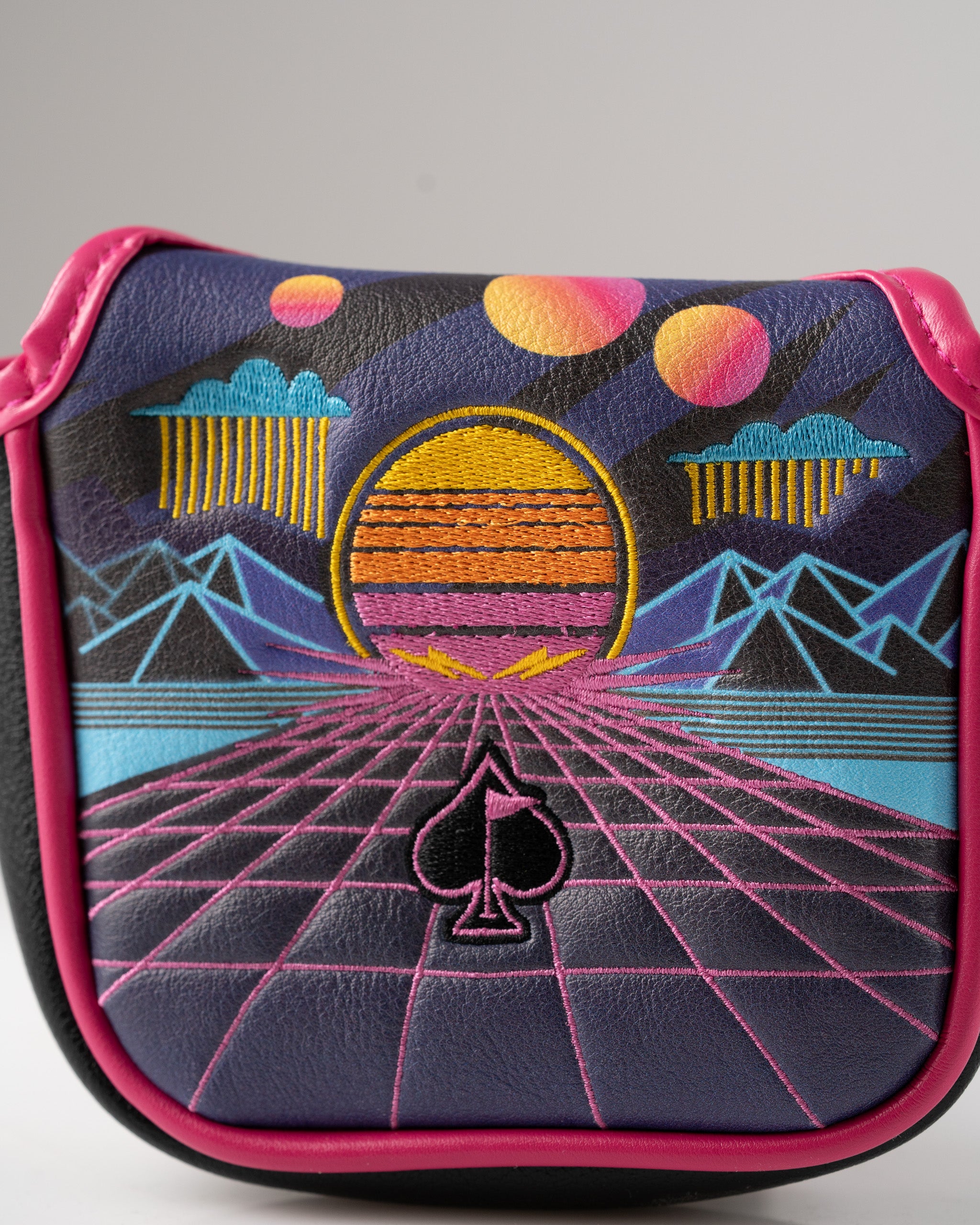 Bold mallet putter cover featuring a vibrant synthwave design with a sunset, mountains, and retro colors for standout style.