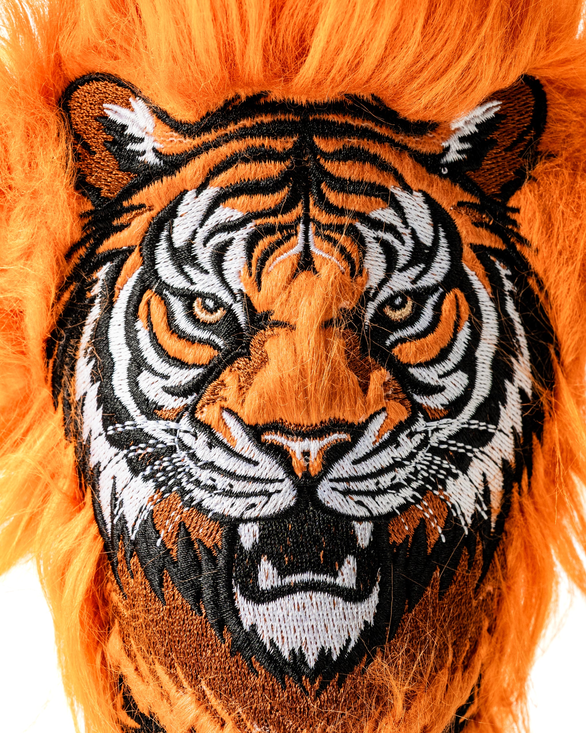 Bold tiger headcover set featuring vibrant orange fur and detailed embroidery, perfect for golfers wanting to stand out.