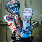 Set of three Top Gun Maverick themed golf club blade headcovers with skull and pilot helmet designs in black, white, and blue colors.