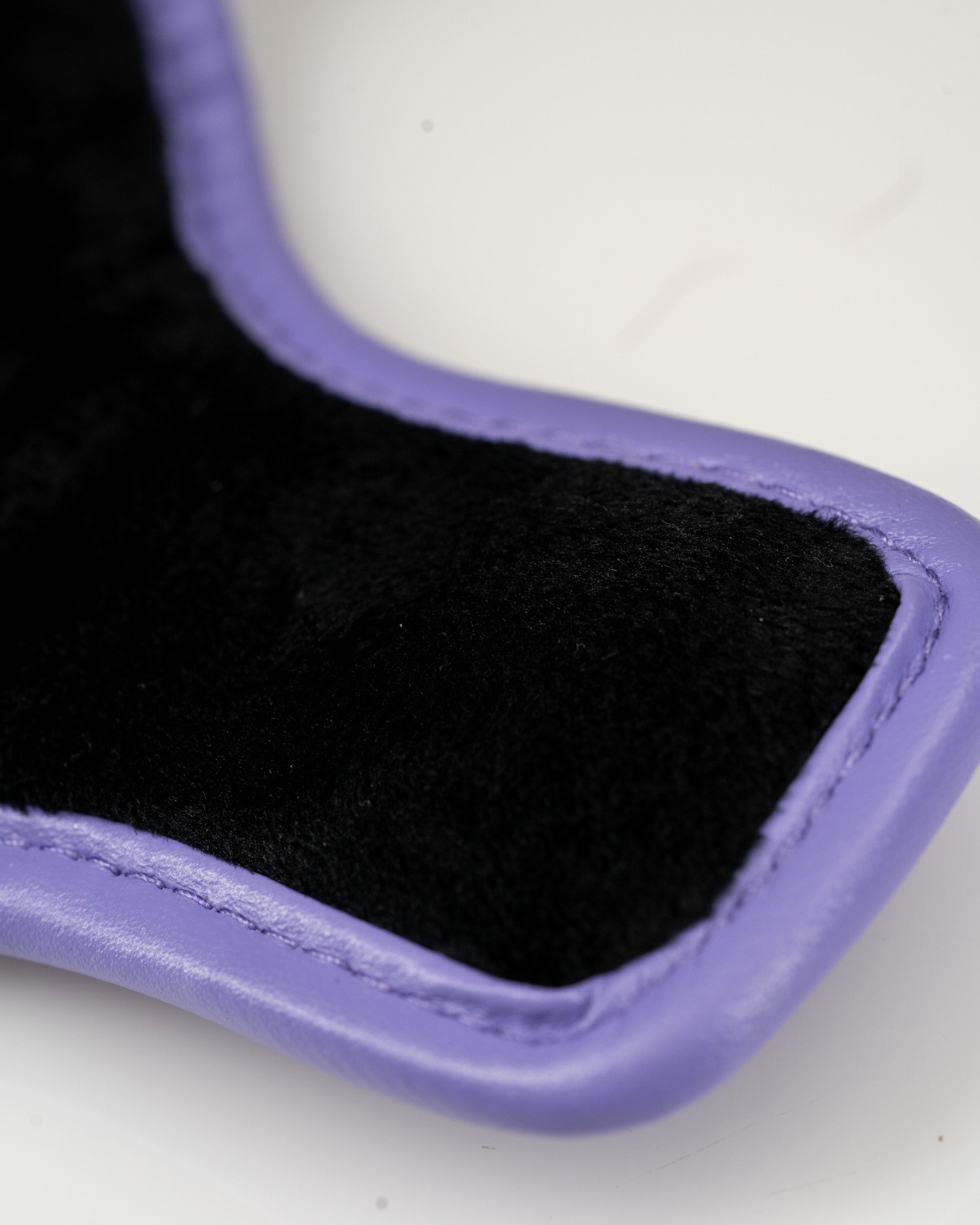 South Park Towelie mallet putter cover featuring a soft black interior and a vibrant purple exterior for stylish protection.