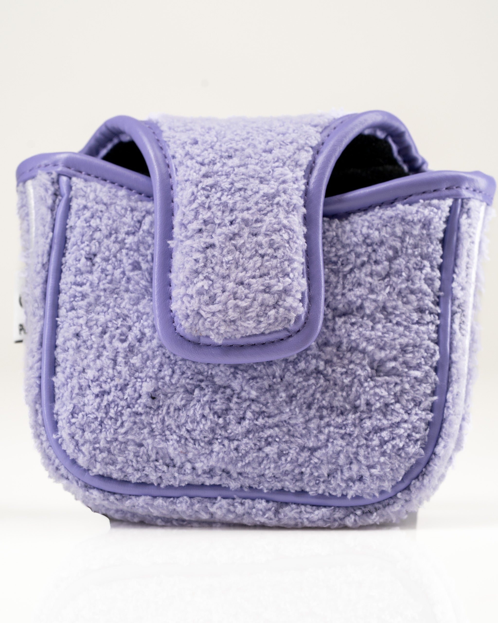 Purple towel-like mallet putter cover featuring a soft texture, designed for golfers who enjoy unique and playful accessories.