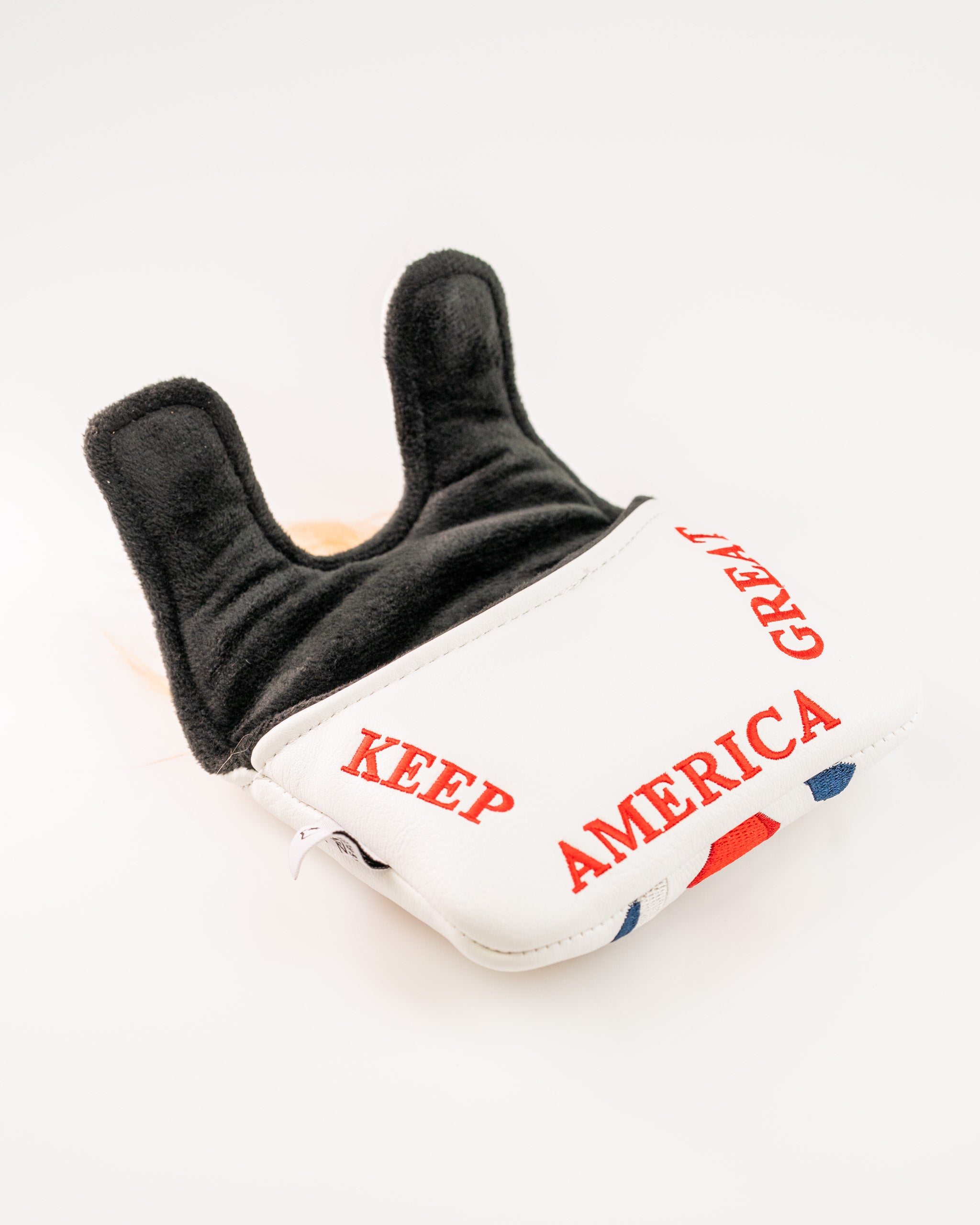 White mallet putter cover featuring "KEEP AMERICA GREAT" text, designed for center shaft putters, with a soft interior.